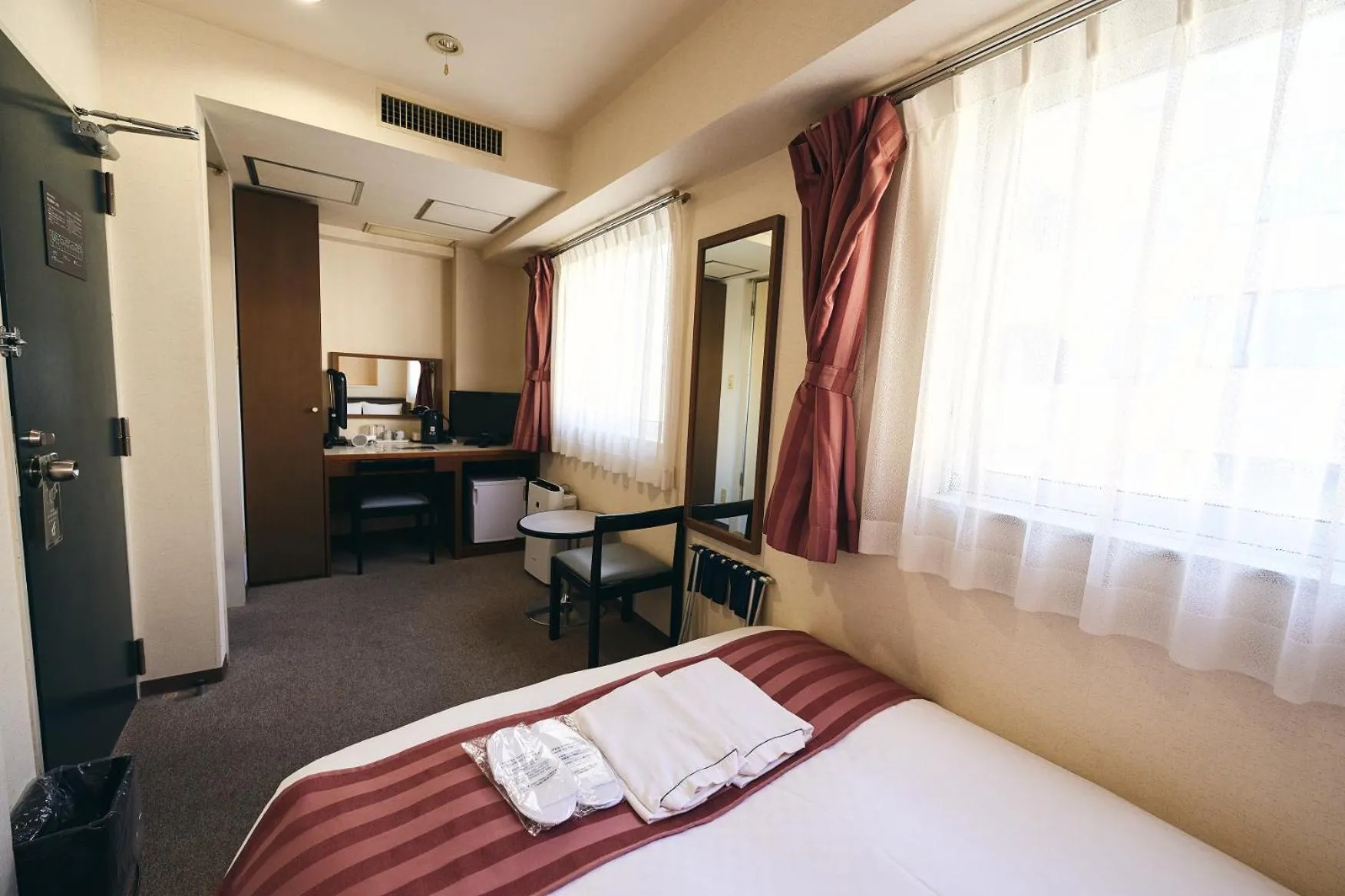 Bed in Hotel Astir Nagoya Sakae