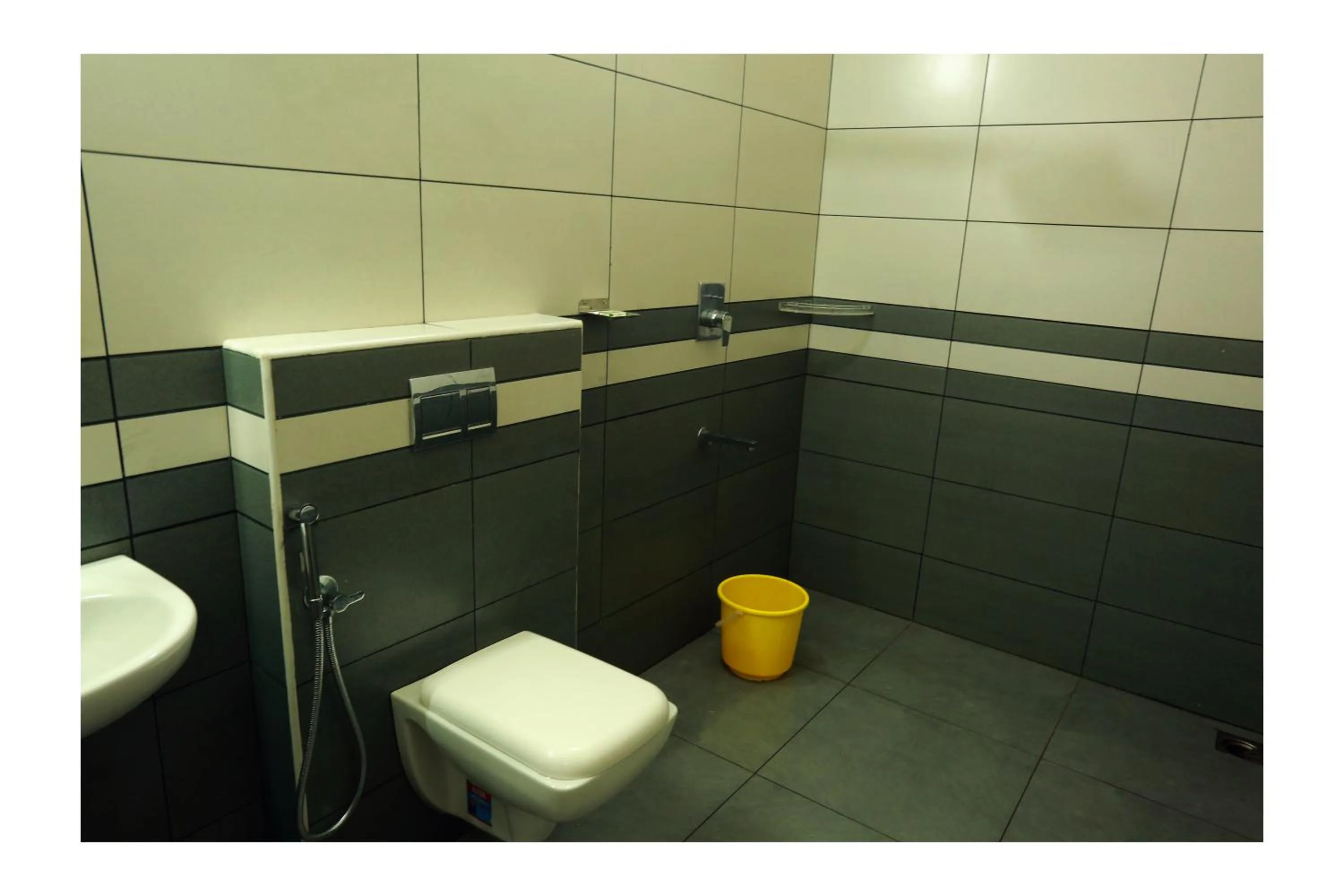 Bathroom in CORRIDOR CALICUT Airport Hotel