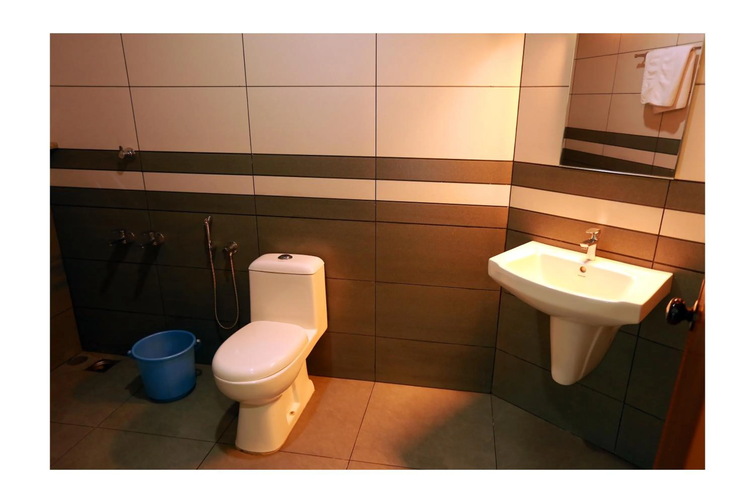 Bathroom in CORRIDOR CALICUT Airport Hotel