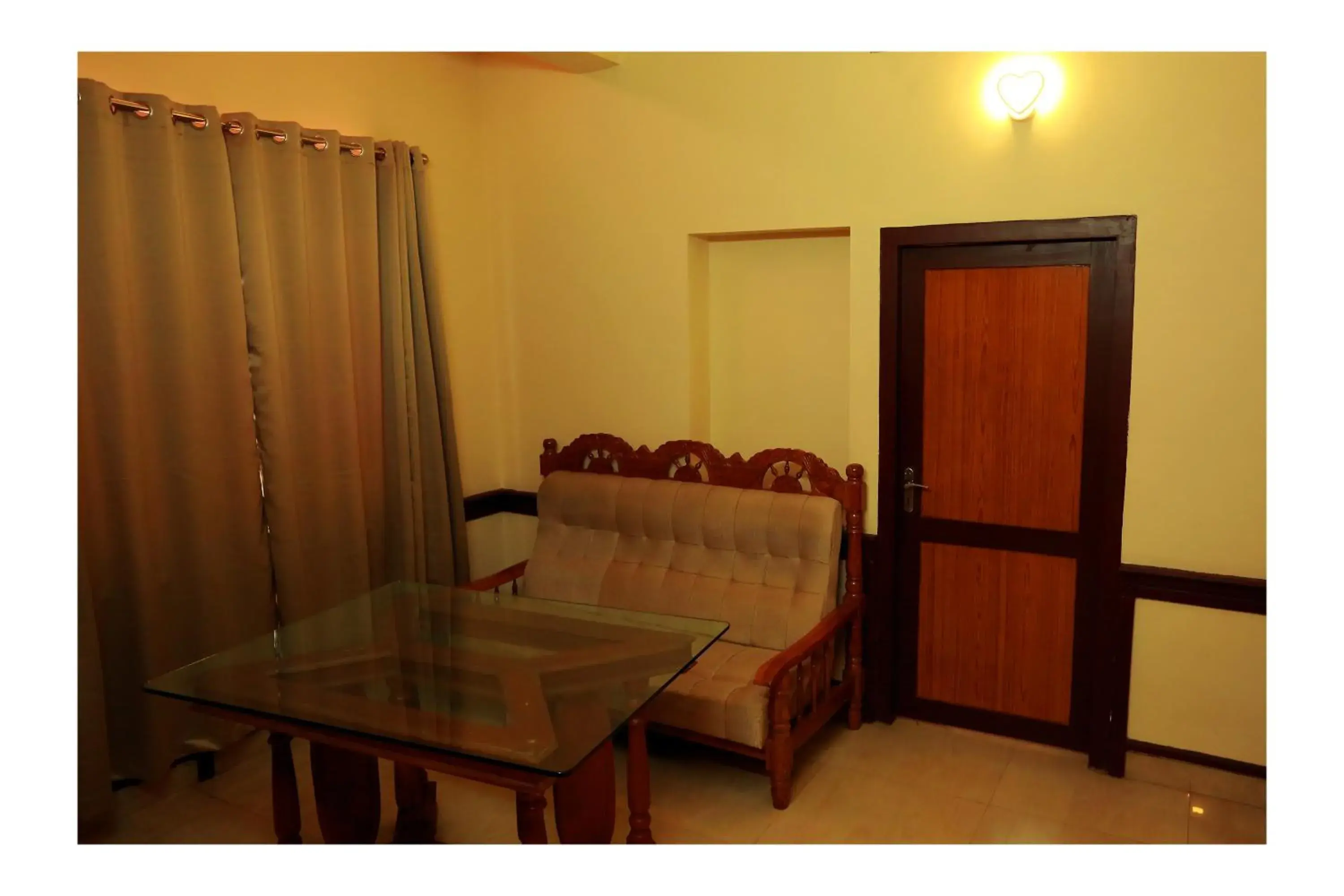 Living room in CORRIDOR CALICUT Airport Hotel Living room in CORRIDOR CALICUT Airport Hotel