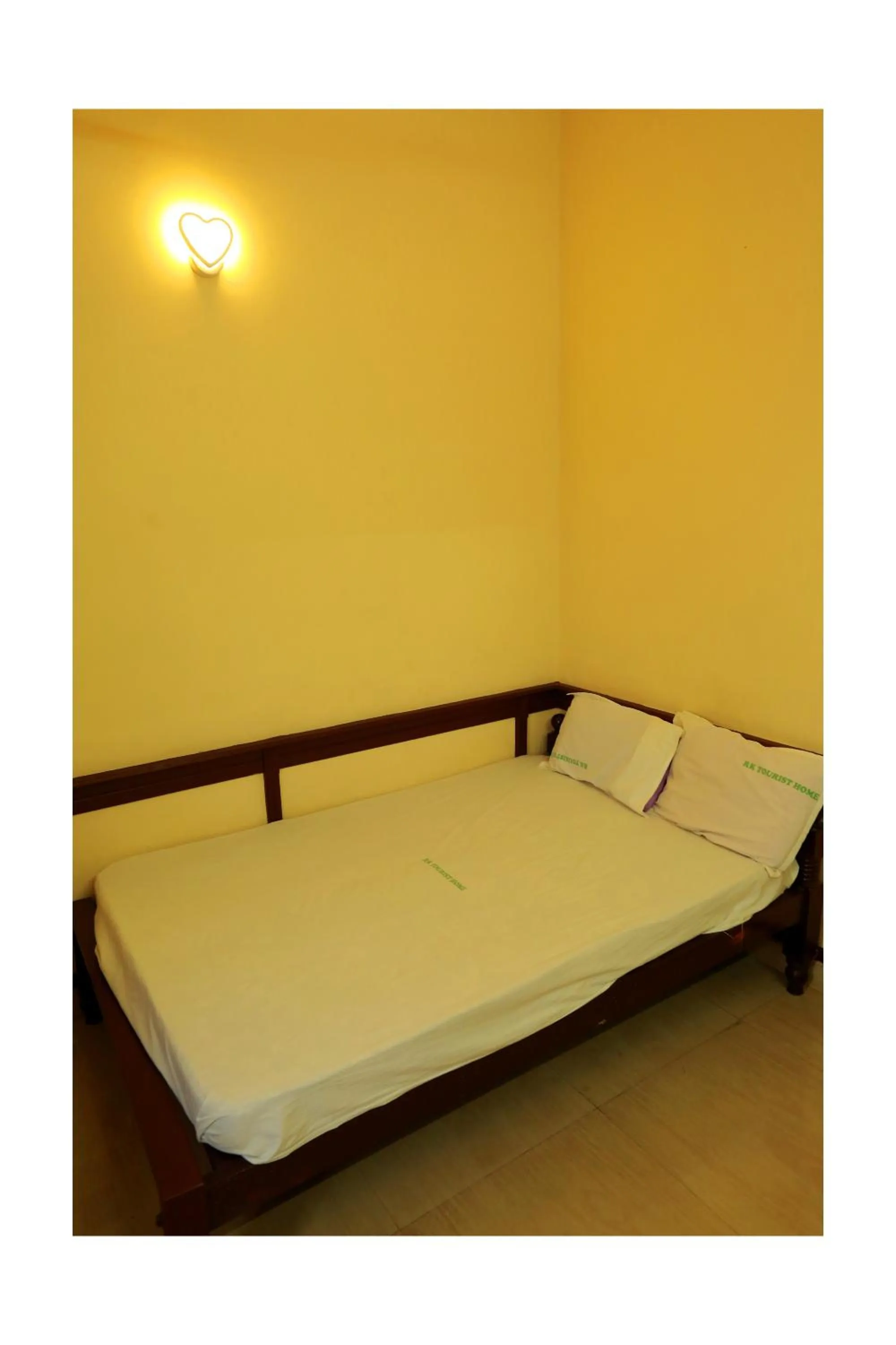 Bed in CORRIDOR CALICUT Airport Hotel