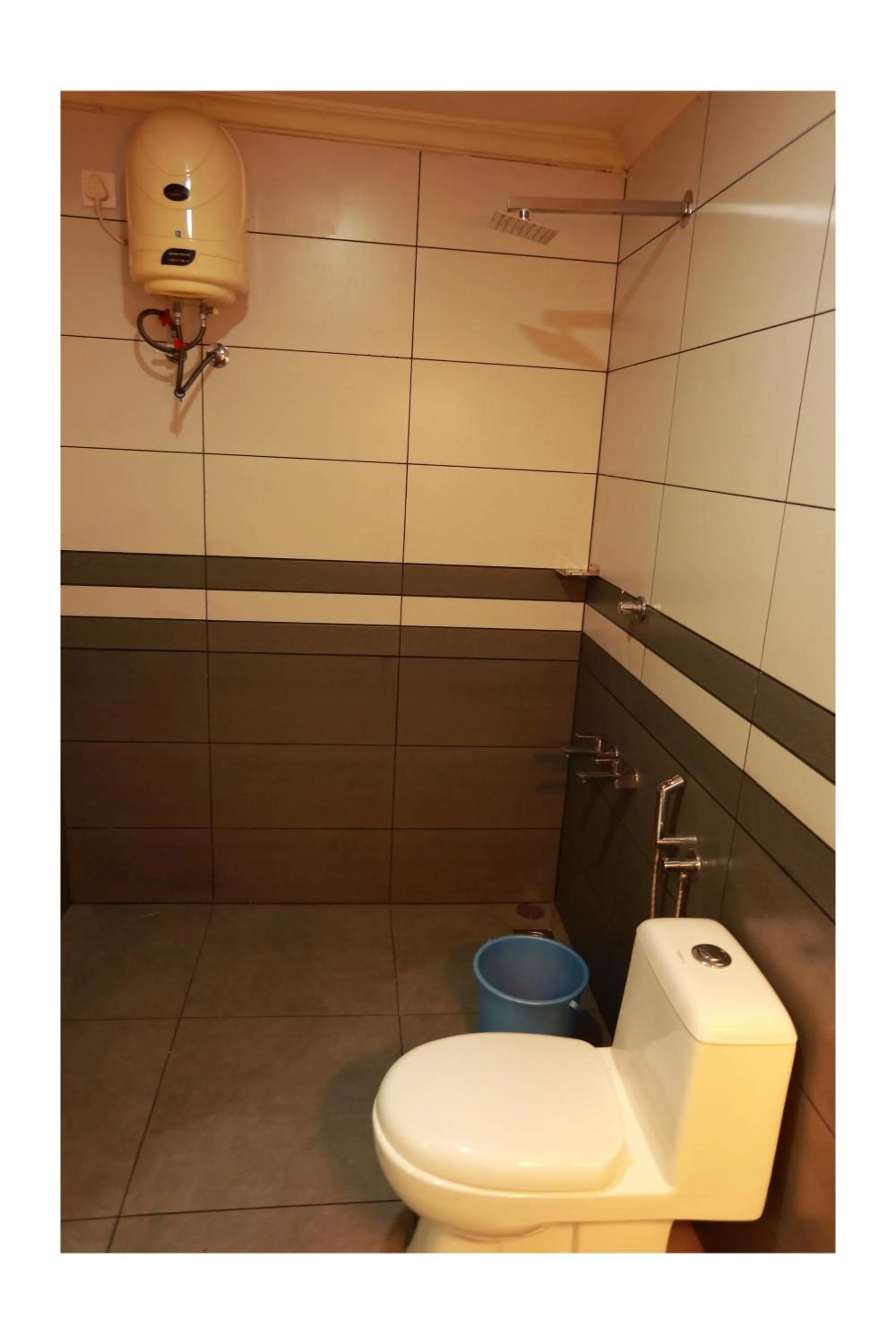 Toilet in CORRIDOR CALICUT Airport Hotel