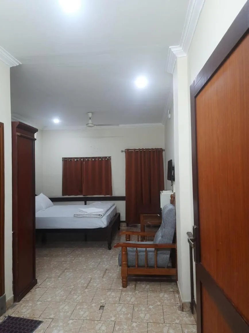 Bedroom in CORRIDOR CALICUT Airport Hotel