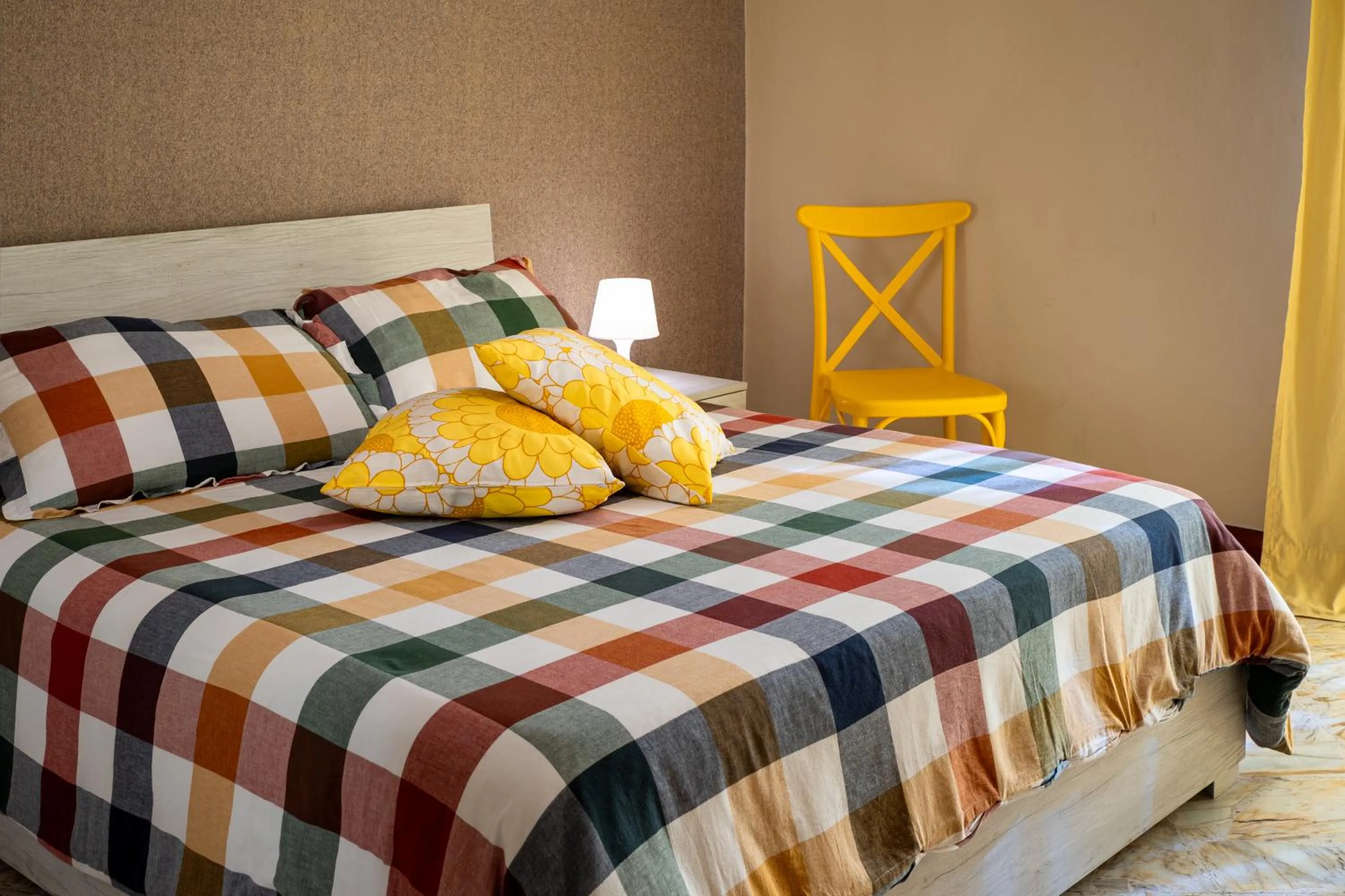 Bed in AJ Suite and Breakfast