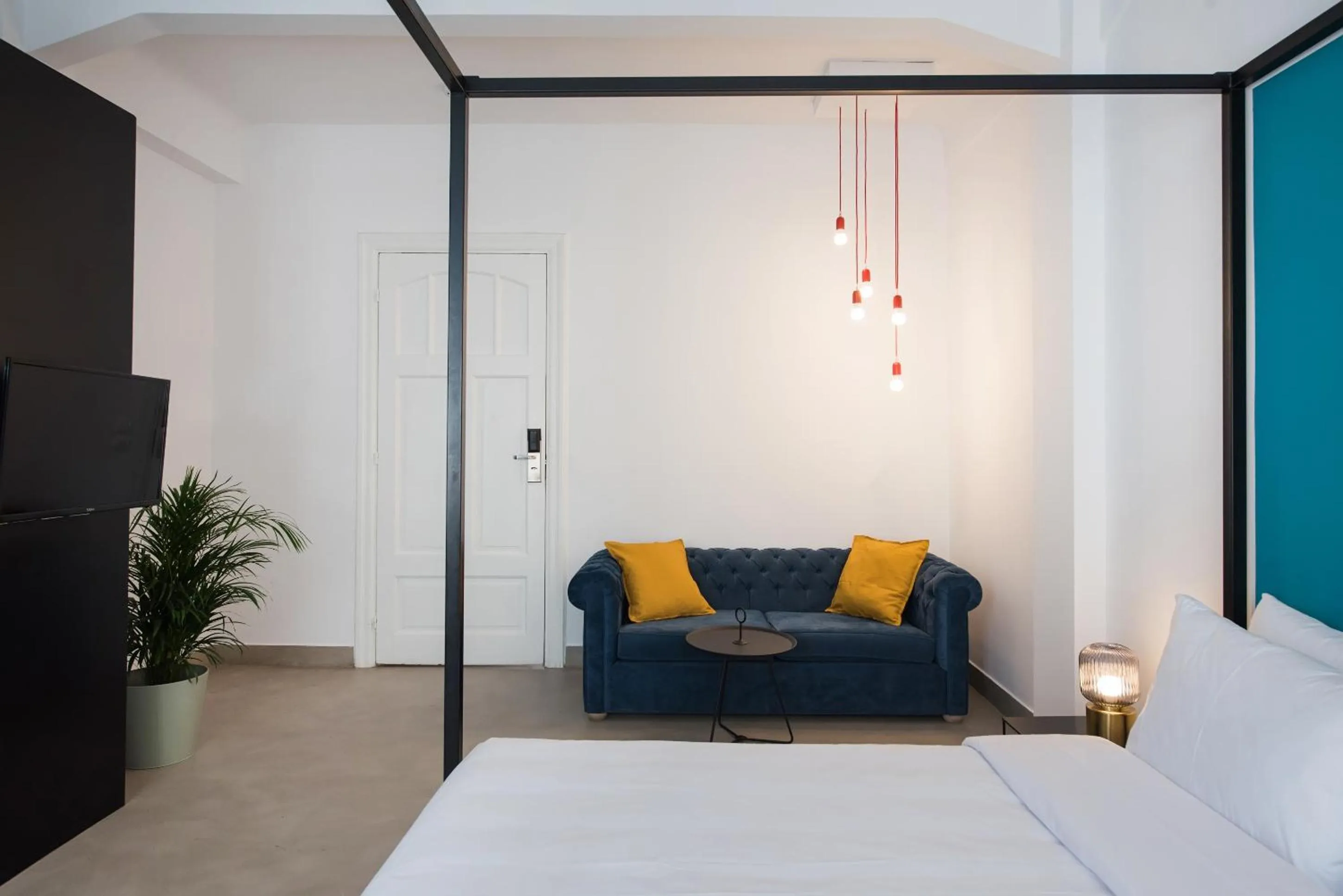 Seating area, Bed in MONK Monastiraki Suites