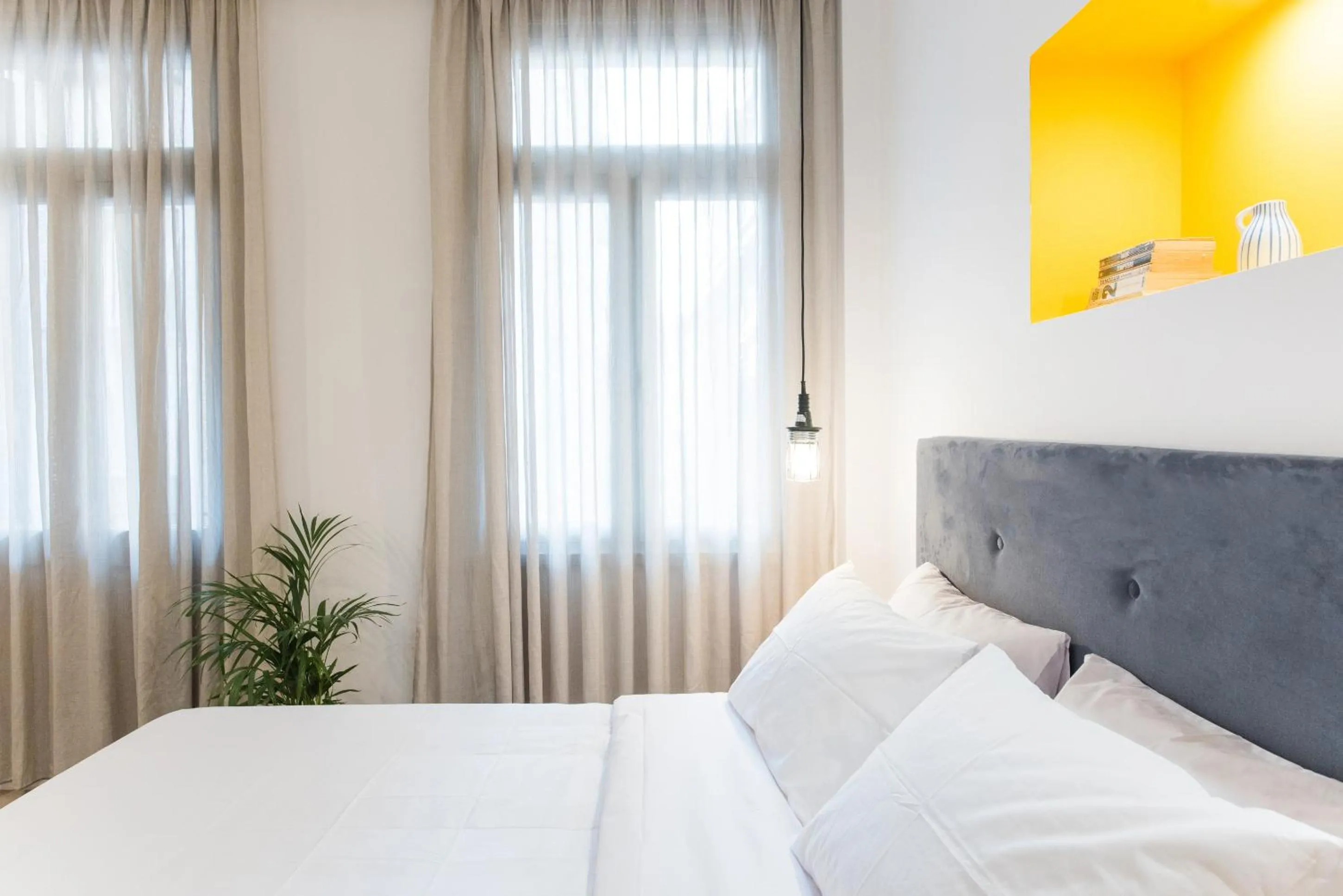 Bed in MONK Monastiraki Suites