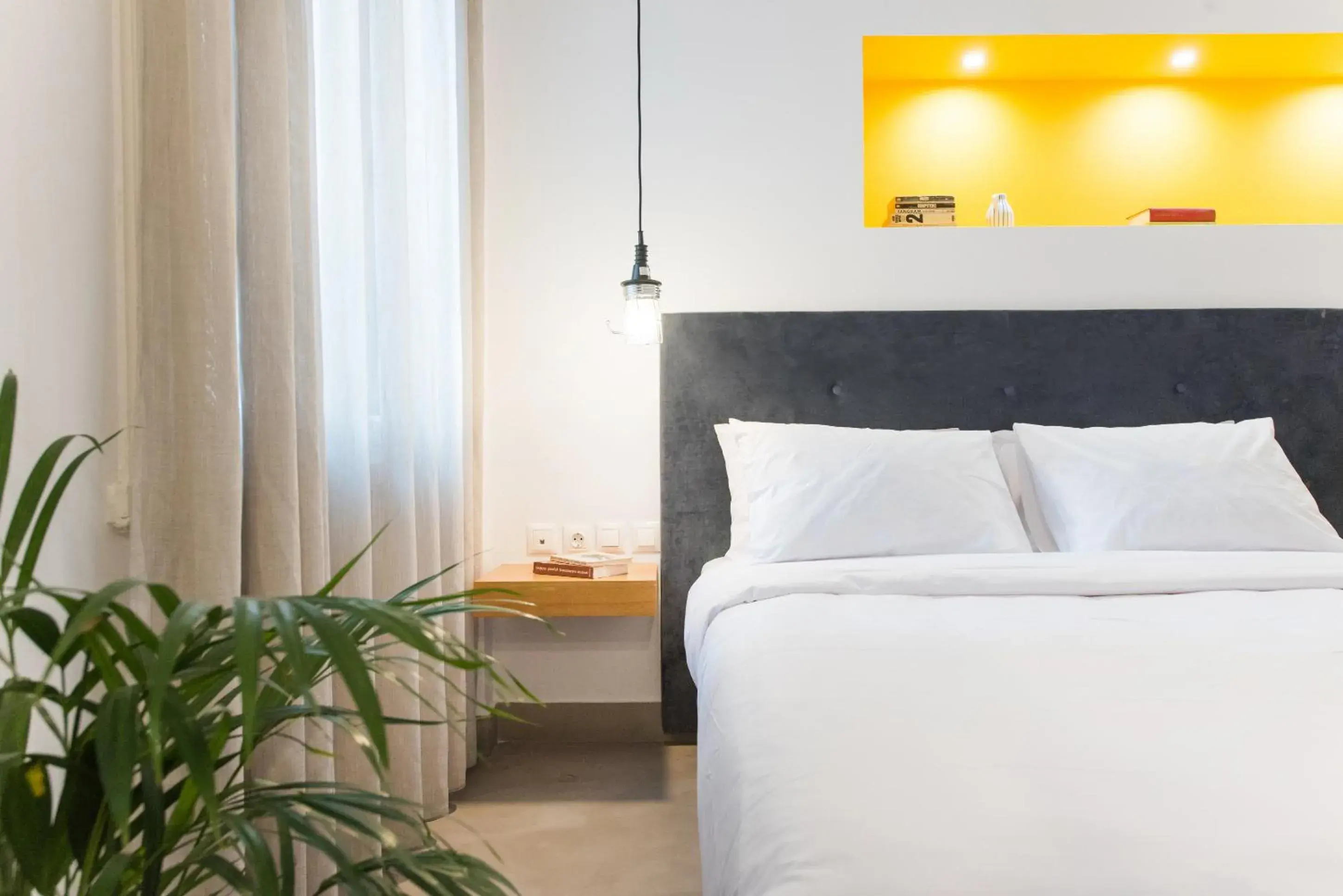 Bed in MONK Monastiraki Suites Bed in MONK Monastiraki Suites