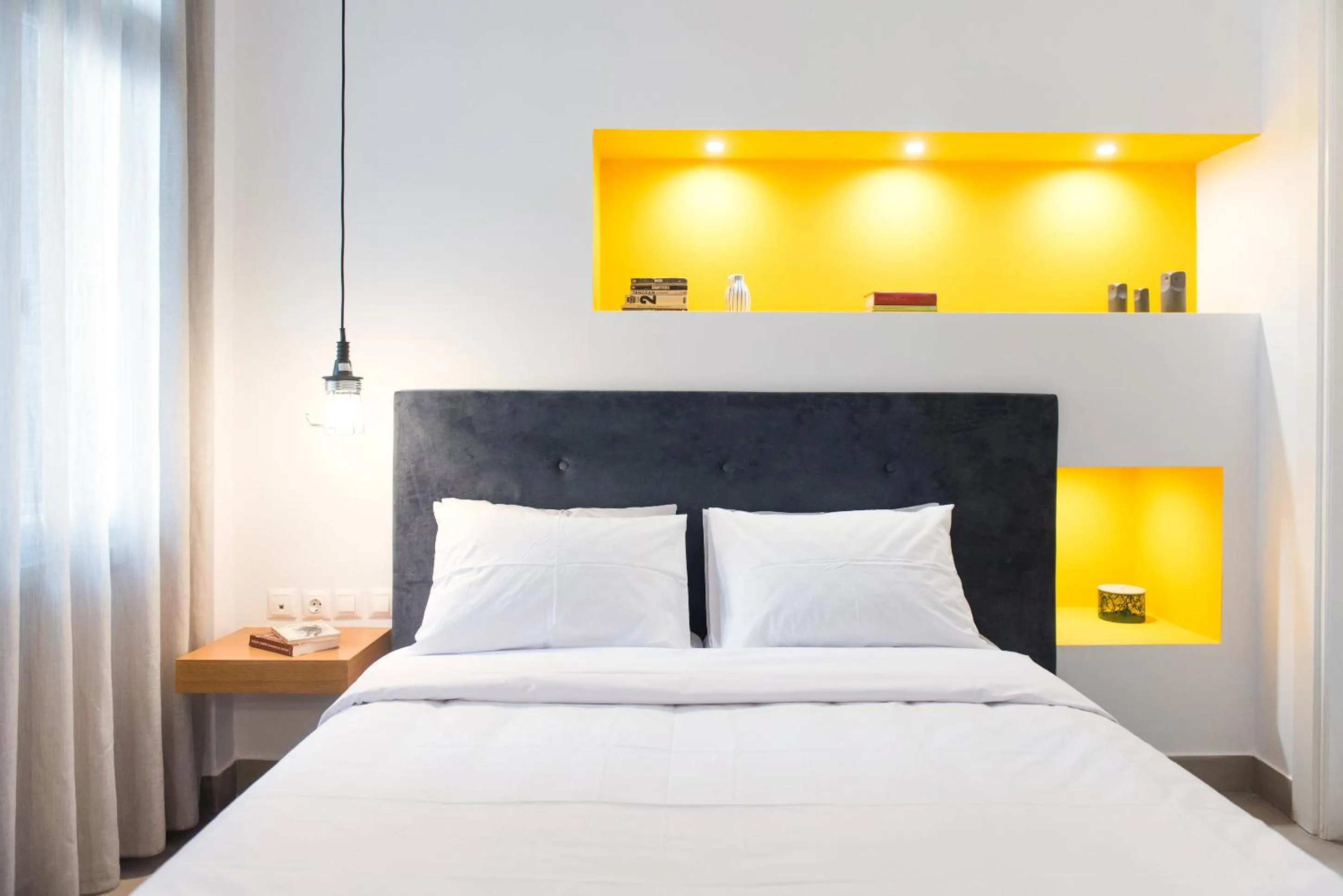 Bed in MONK Monastiraki Suites