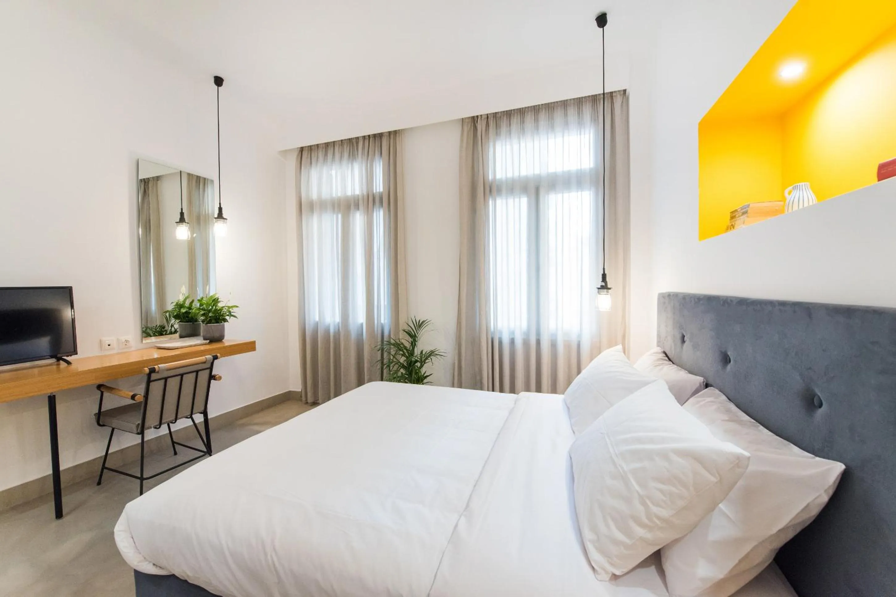 Bed in MONK Monastiraki Suites