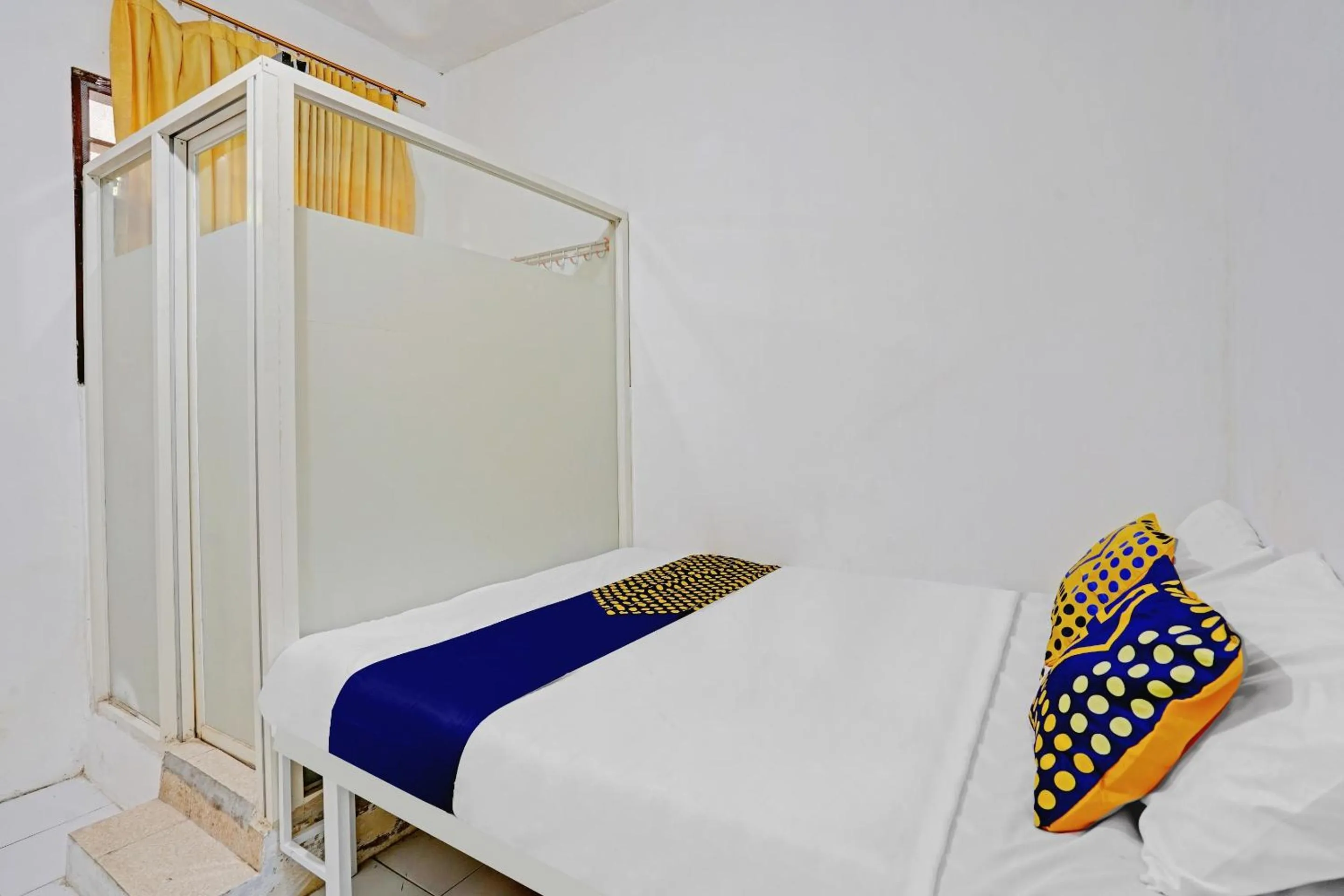 Bedroom in SPOT ON 90586 Hagawa Syariah Homestay