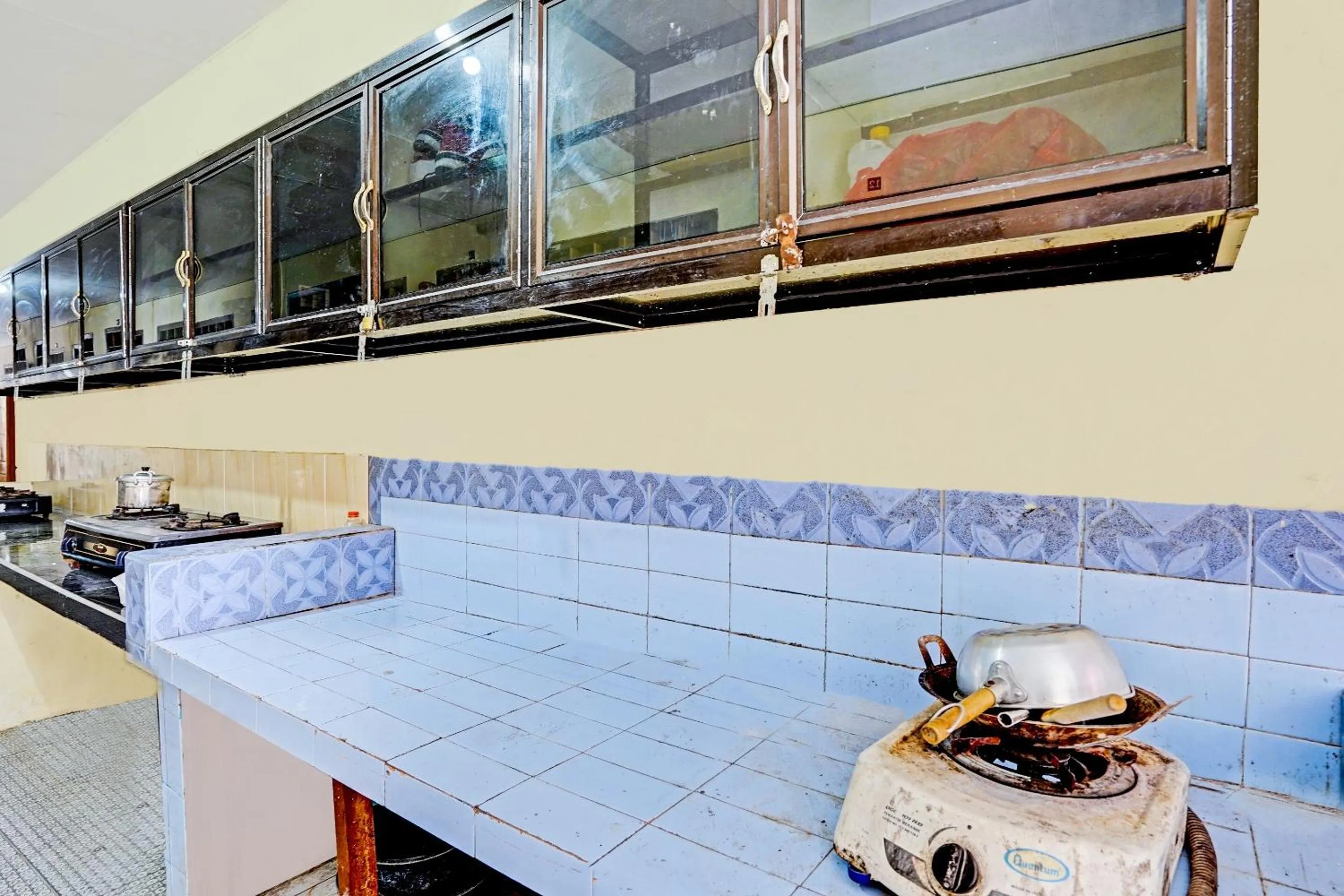 Kitchen or kitchenette in SPOT ON 90586 Hagawa Syariah Homestay