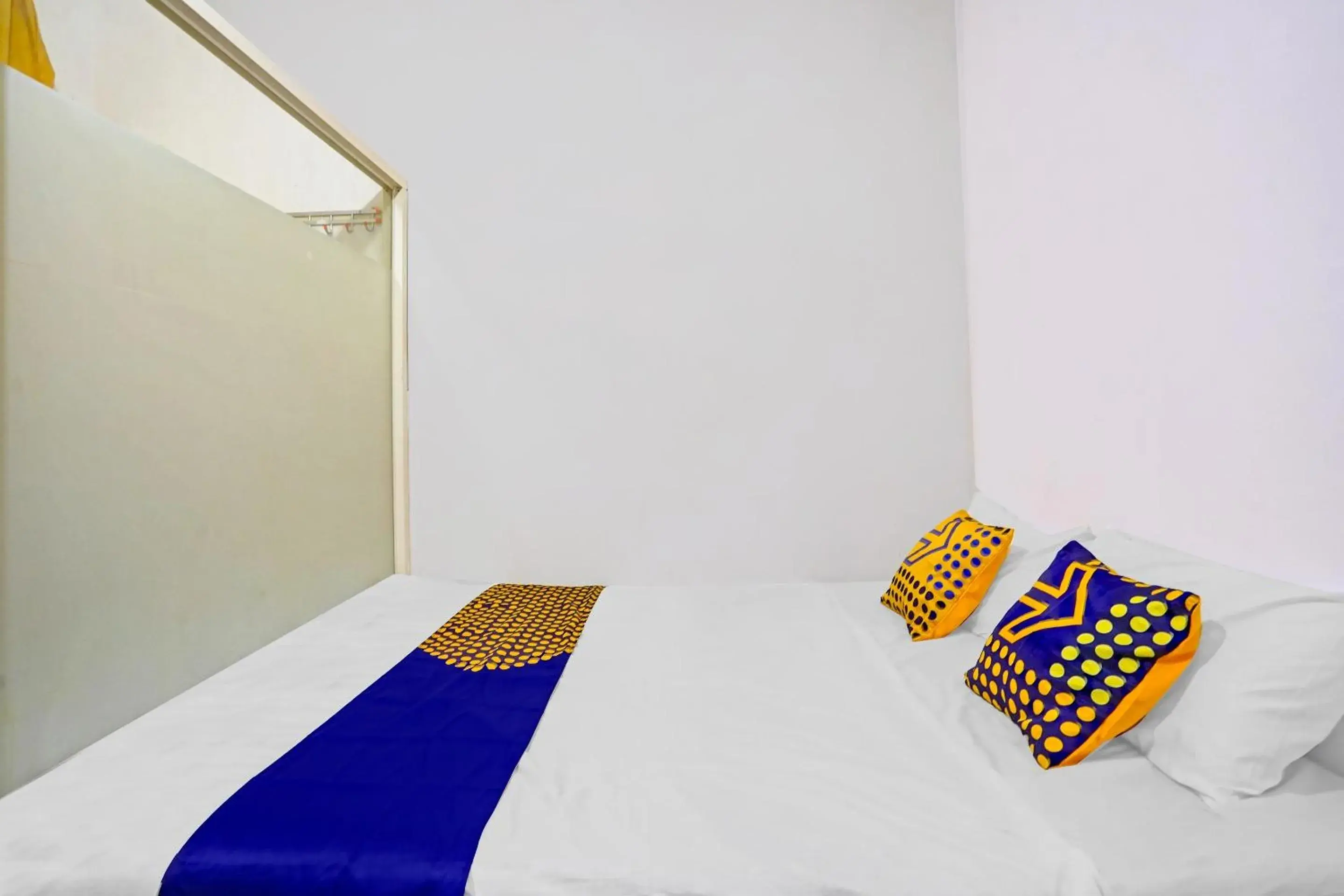 Bedroom in SPOT ON 90586 Hagawa Syariah Homestay Bedroom in SPOT ON 90586 Hagawa Syariah Homestay