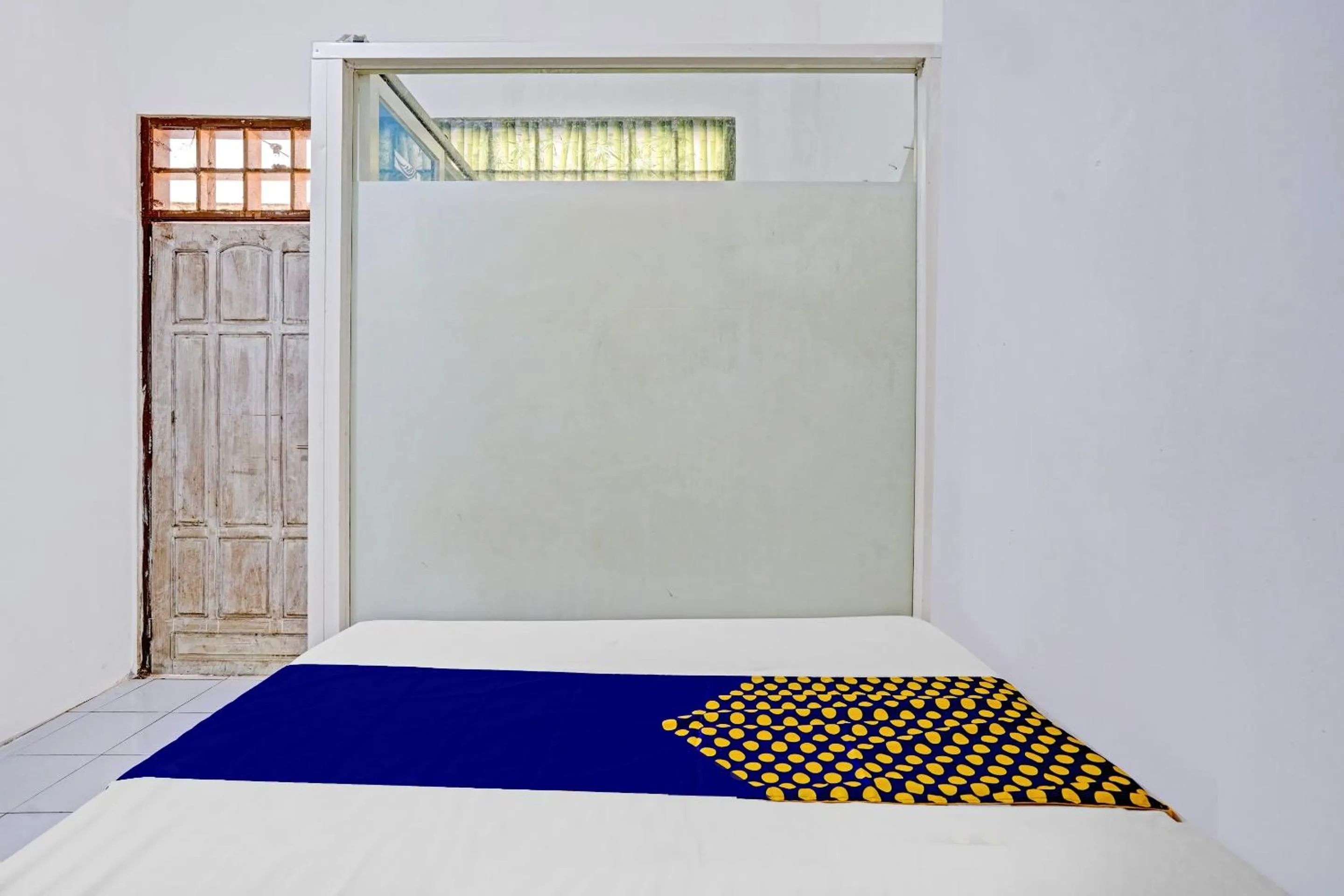 Bedroom in SPOT ON 90586 Hagawa Syariah Homestay