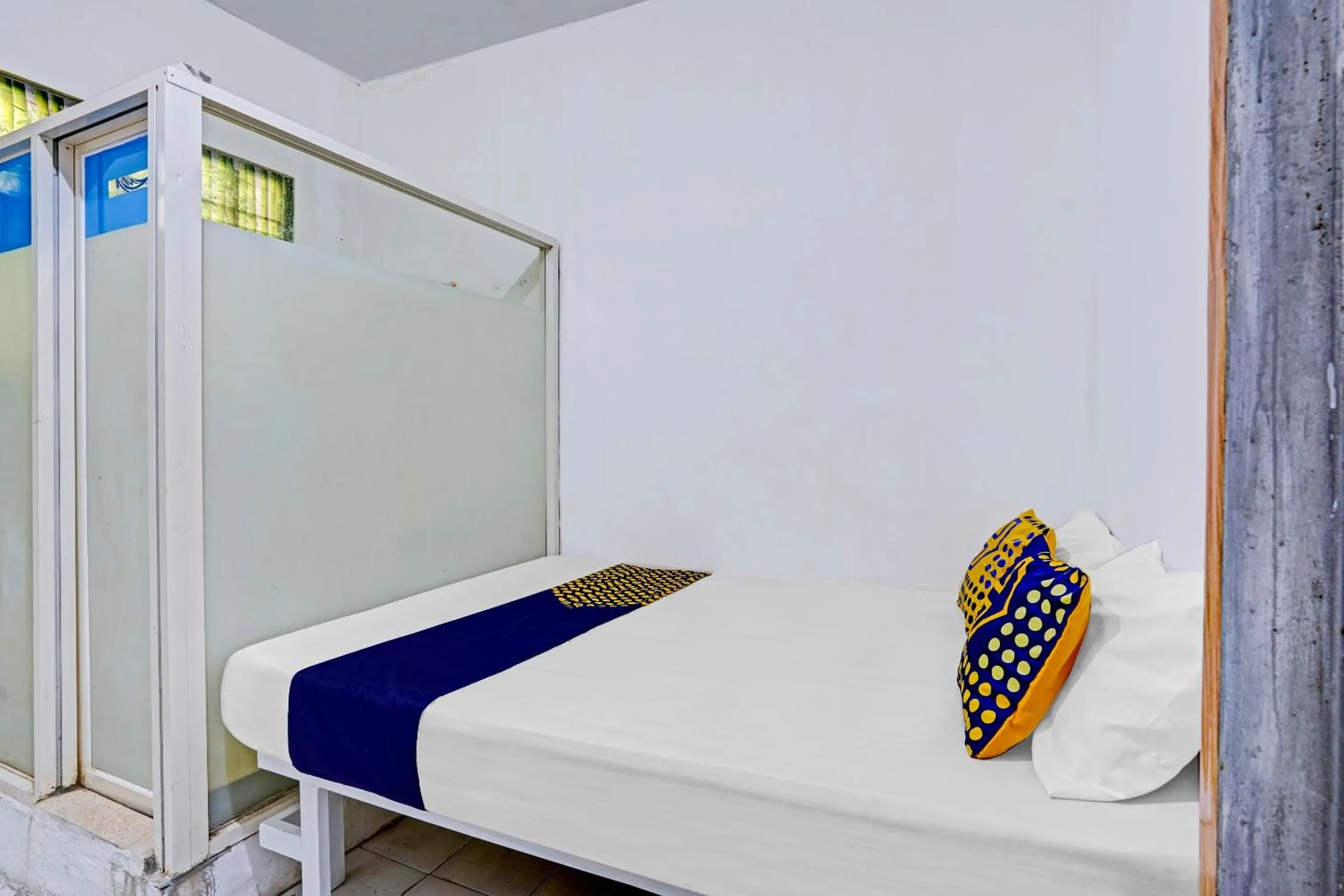 Bedroom in SPOT ON 90586 Hagawa Syariah Homestay