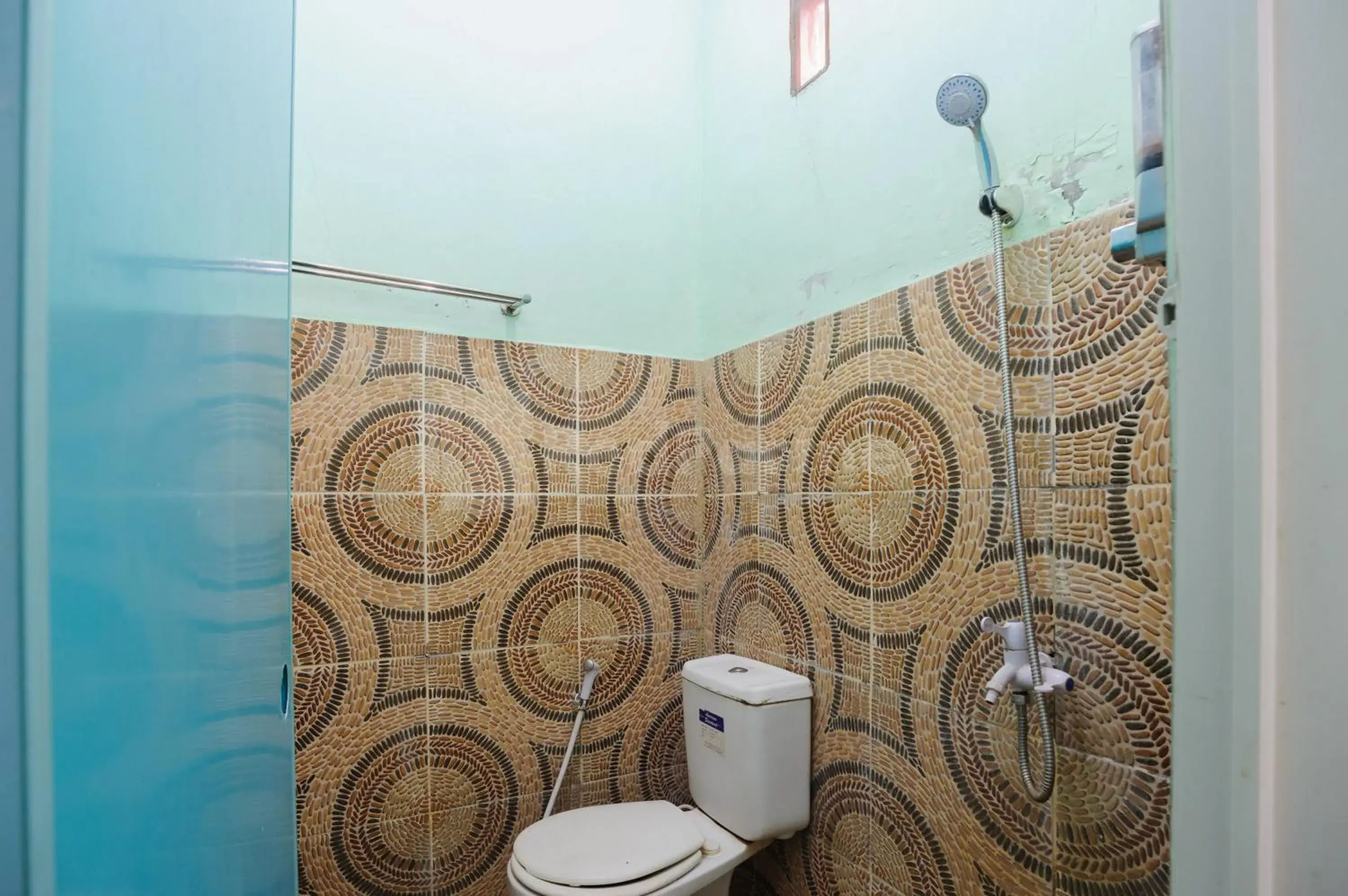 Bathroom in Fajar Inn Mitra RedDoorz Bathroom in Fajar Inn Mitra RedDoorz