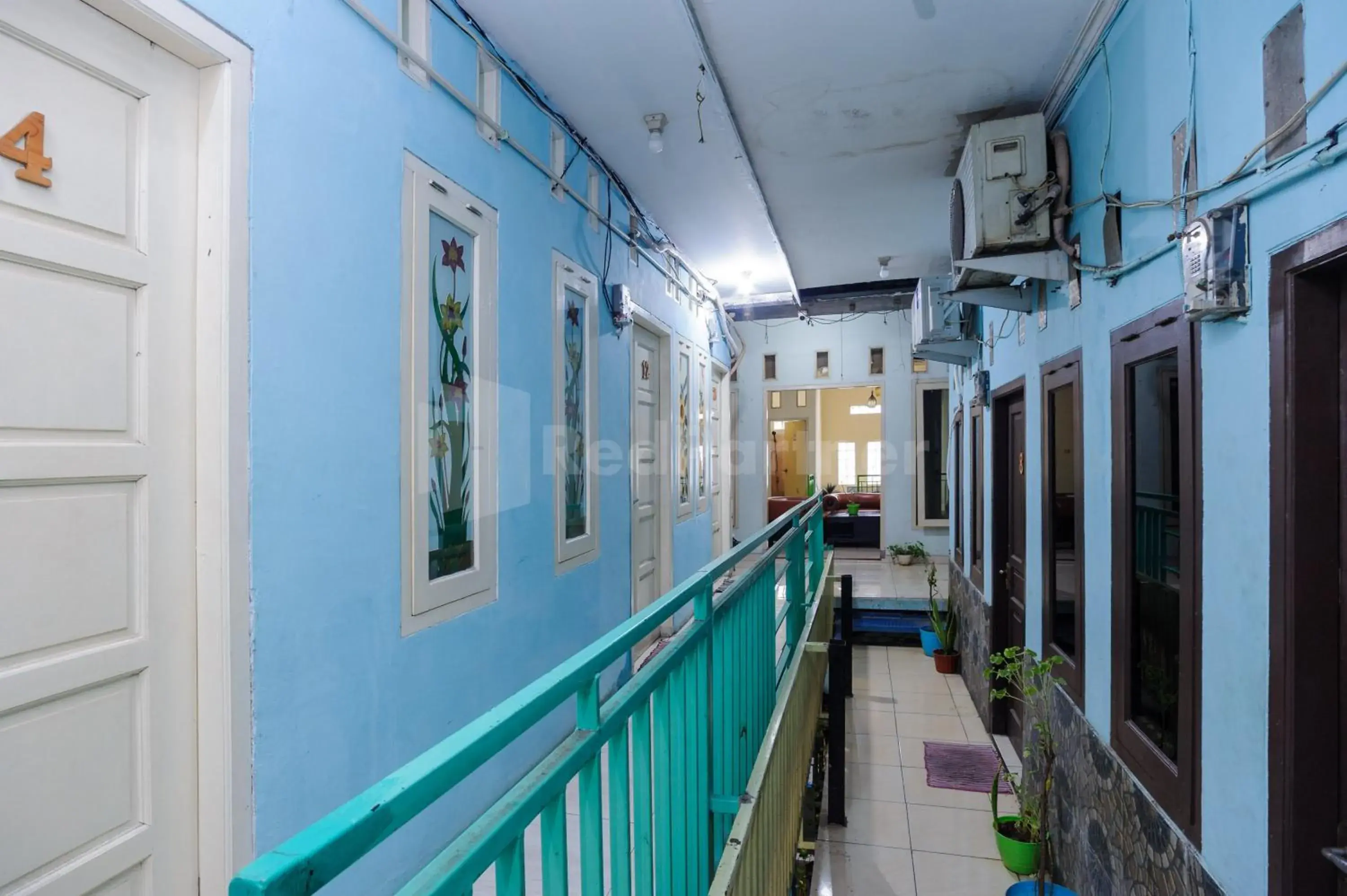 Property building in Fajar Inn Mitra RedDoorz Property building in Fajar Inn Mitra RedDoorz