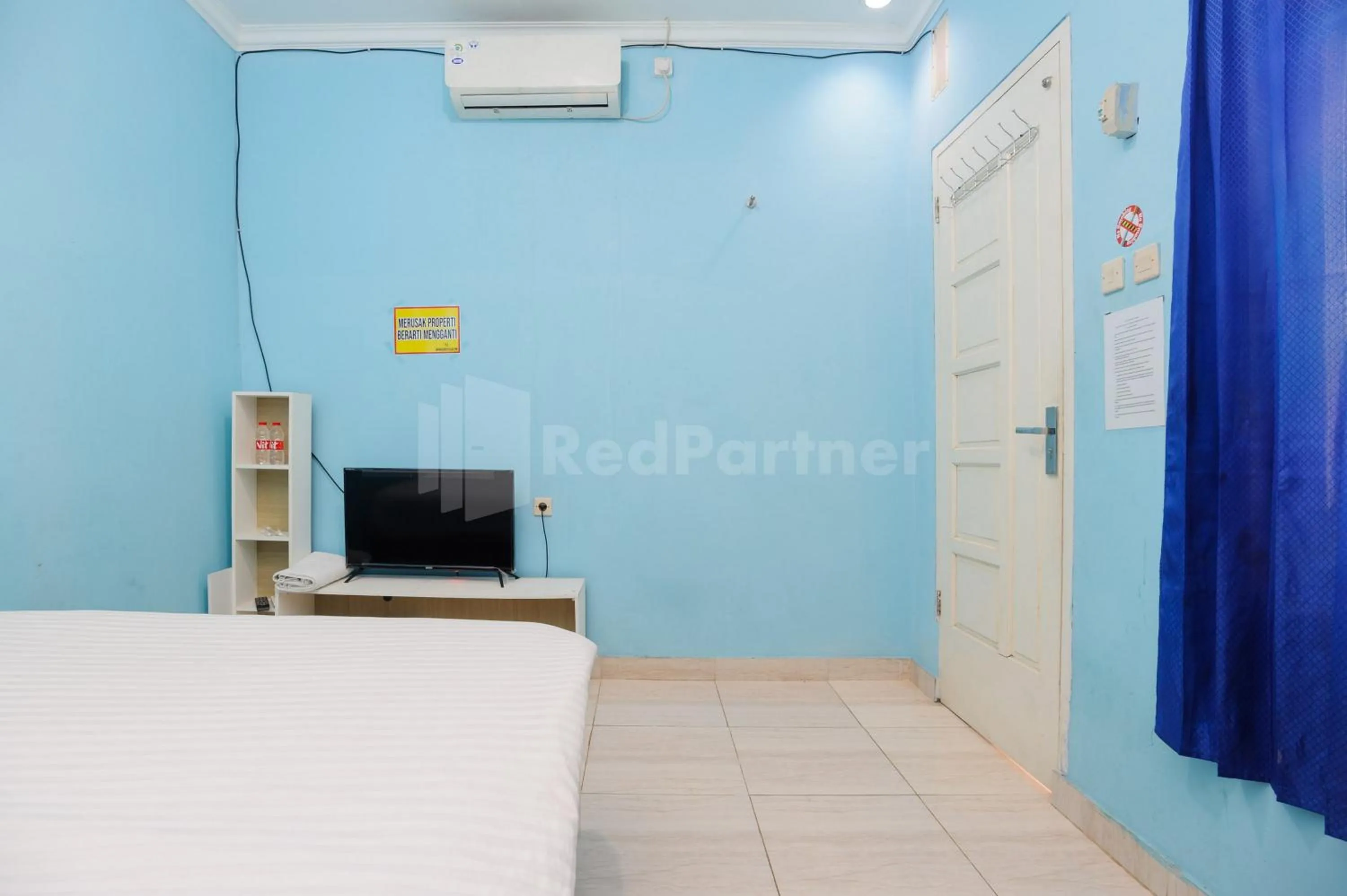 Bed in OYO 90594 Fajar Inn