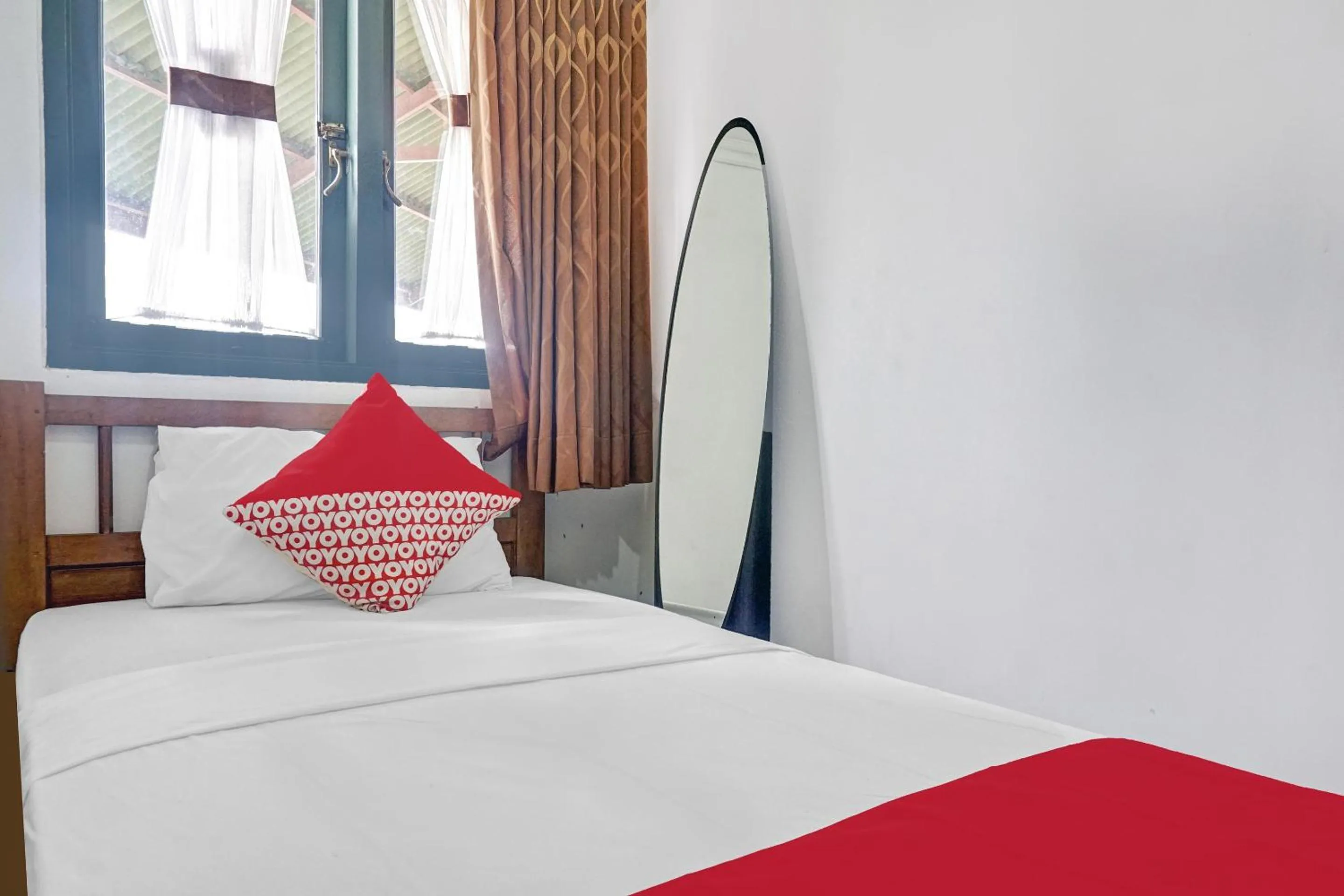 Bed in Hotel O 90596 Hotel Griya Astoeti