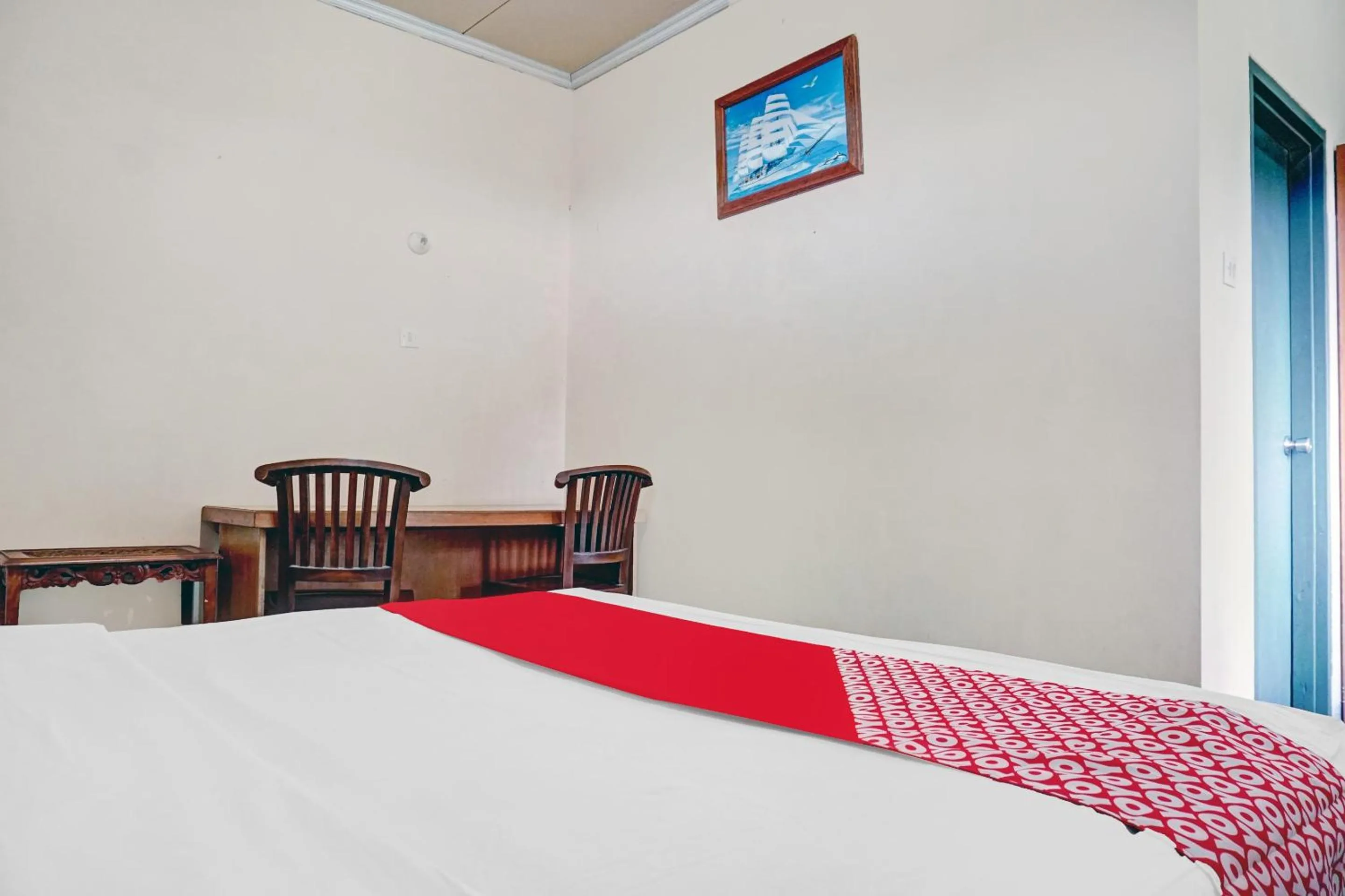 Bed in Hotel O 90596 Hotel Griya Astoeti