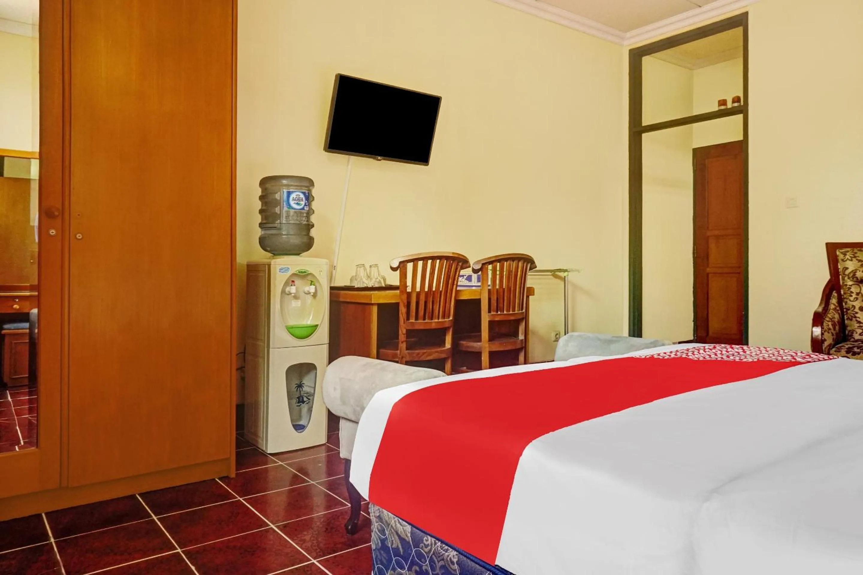 Bed in Hotel O 90596 Hotel Griya Astoeti