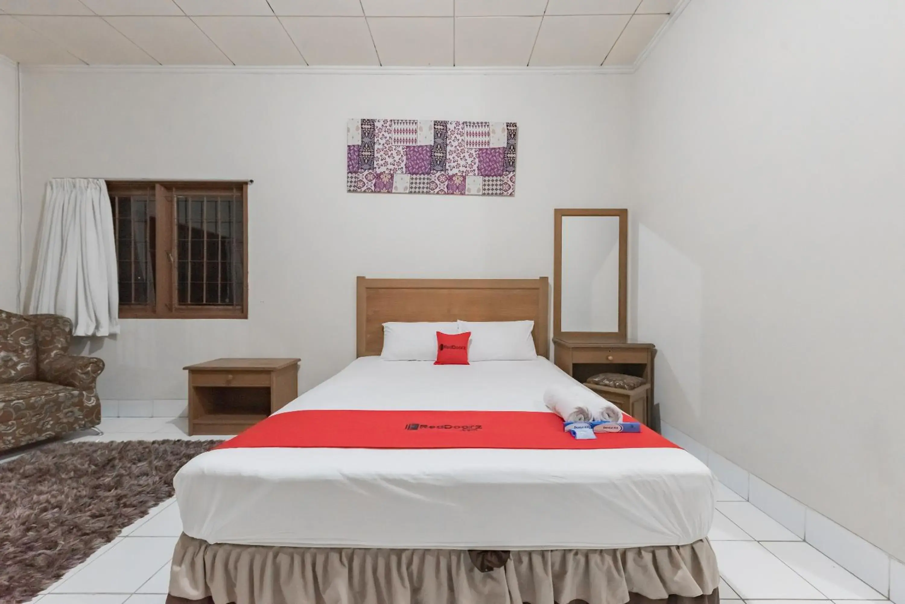 Bed in RedDoorz Plus At Hotel Griya Astoeti Bed in RedDoorz Plus At Hotel Griya Astoeti