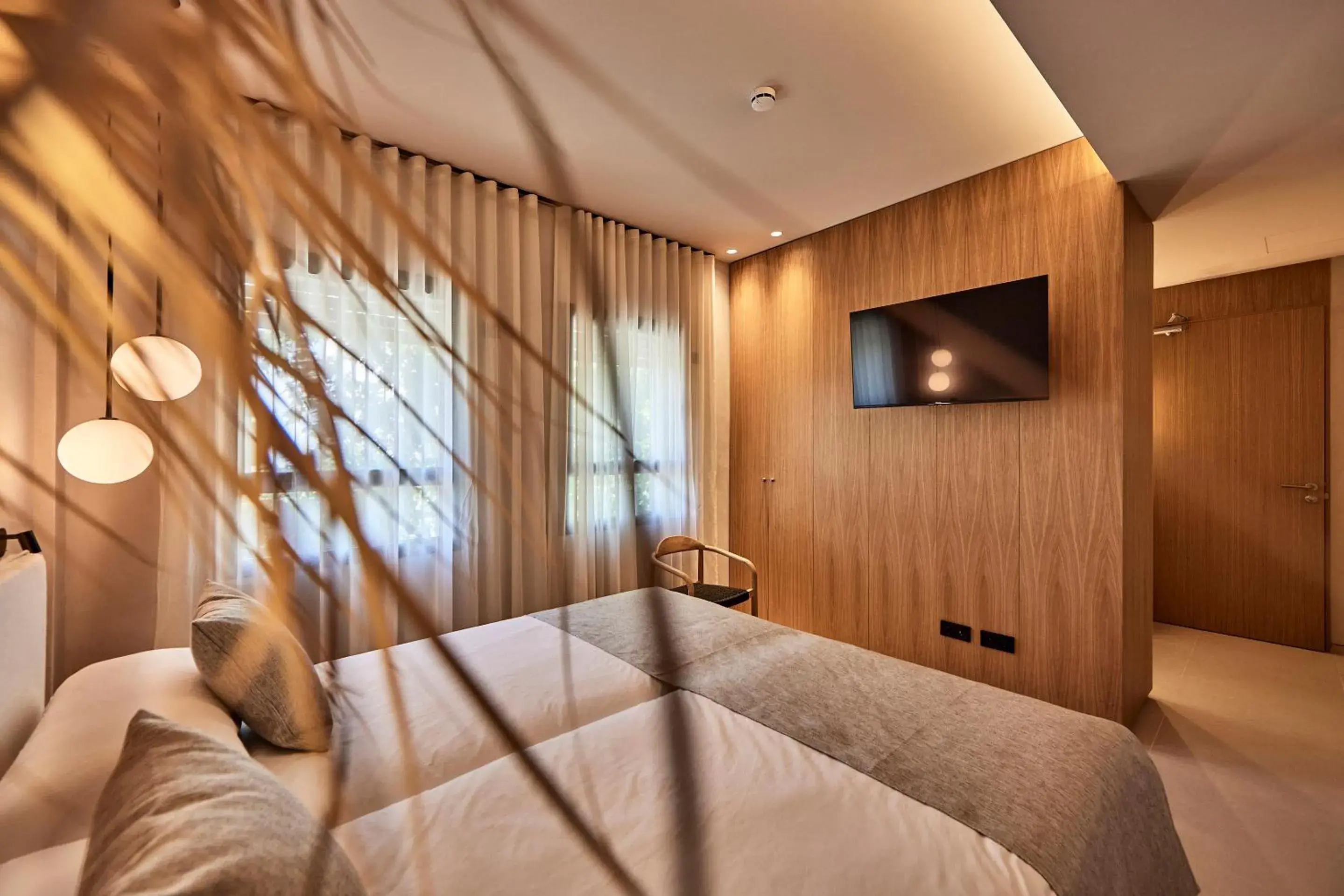 Bed in JOE'S GOMILA BOUTIQUE HOTEL Bed in JOE'S GOMILA BOUTIQUE HOTEL