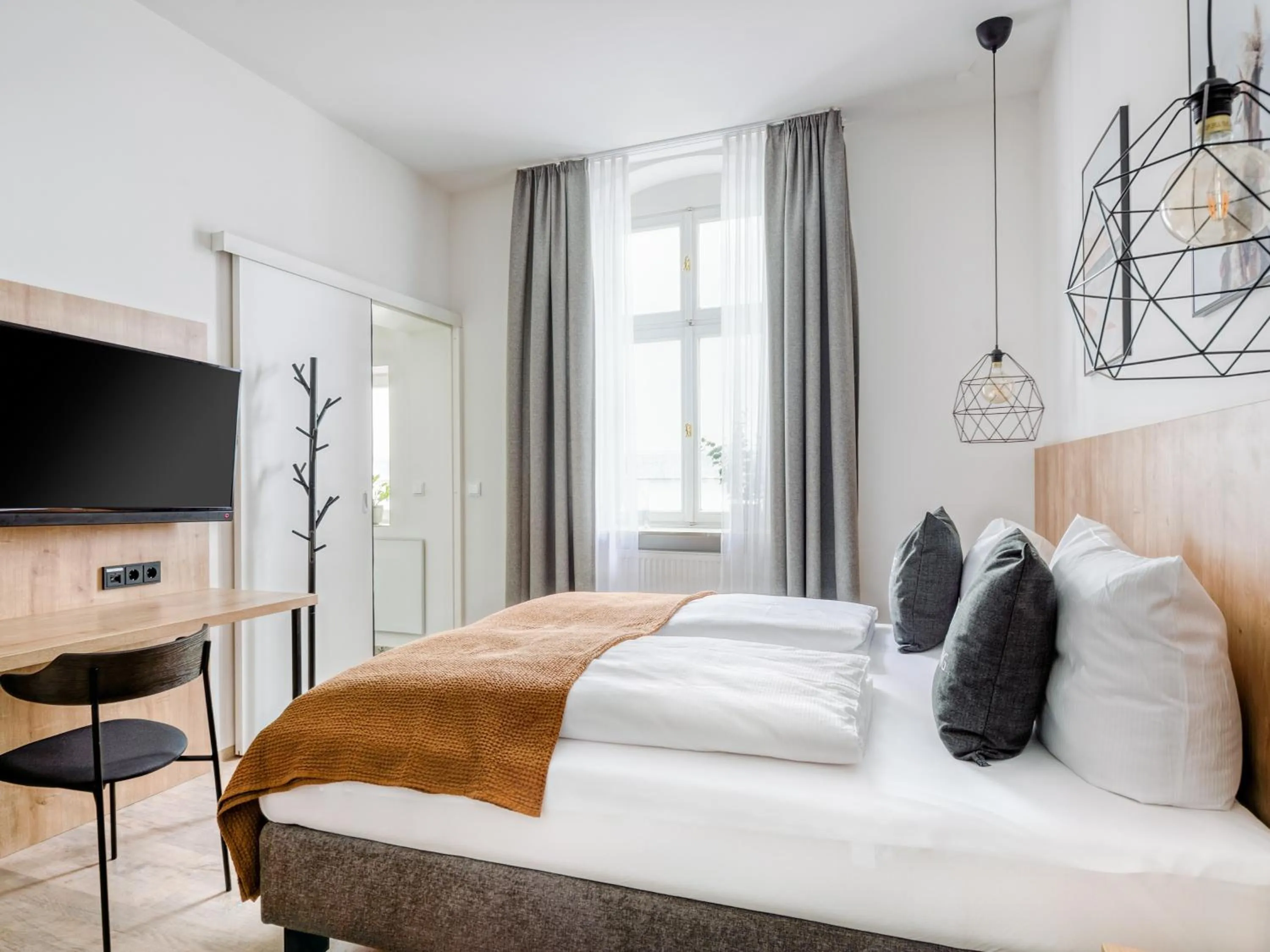 Bed in Limehome Bamberg Keßlerstraße