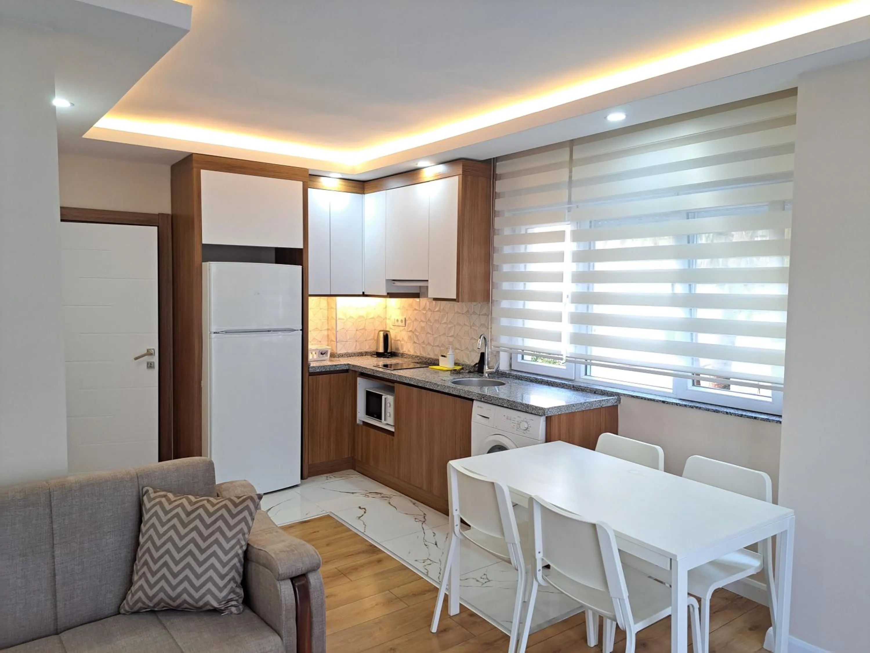 Dining area in Ada APART&HOTEL