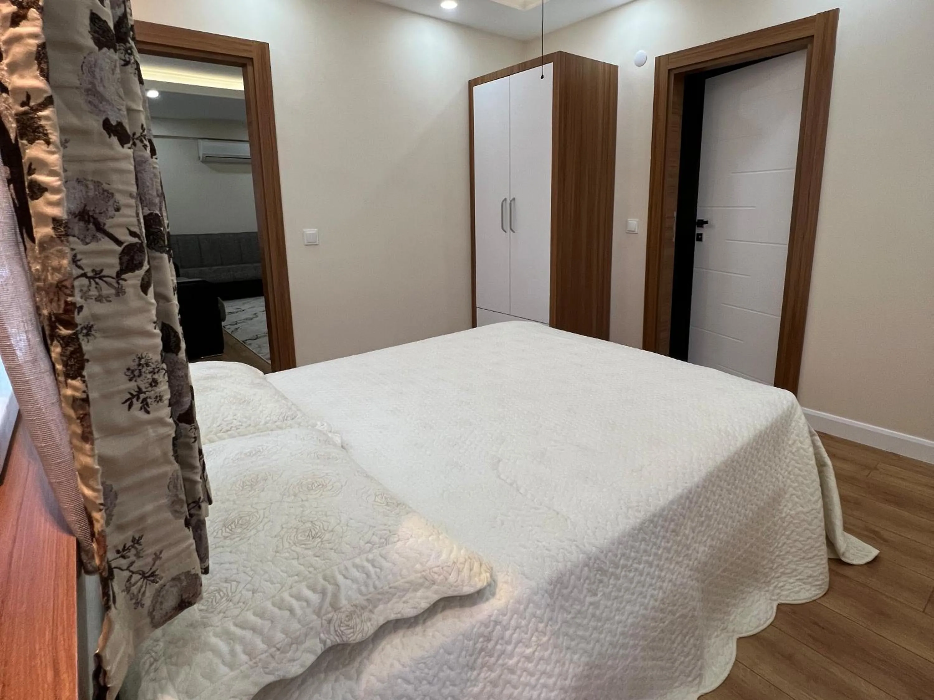 Bed in Ada APART&HOTEL