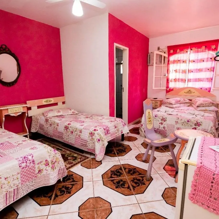 Bed in Pousada Oca Porã