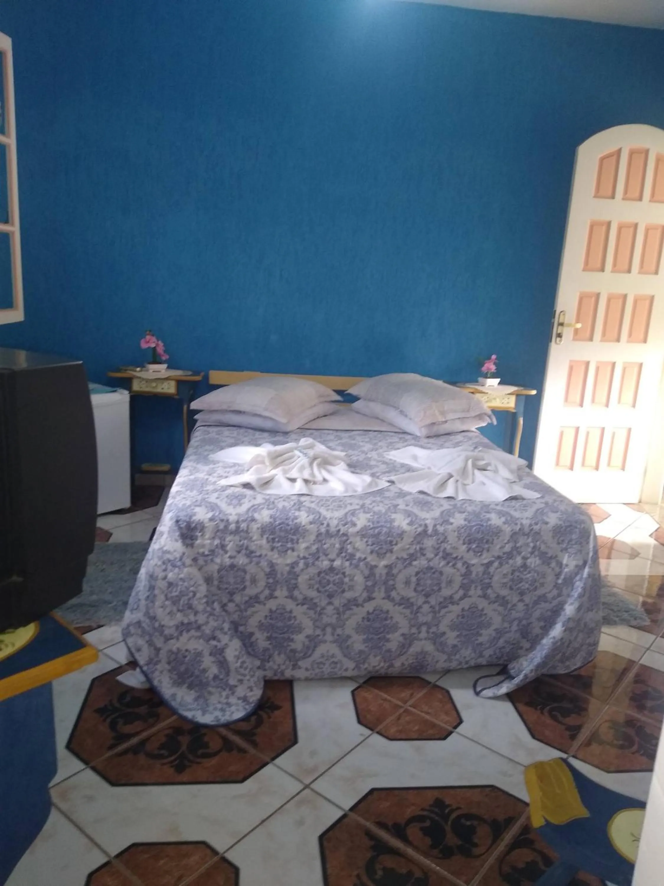 Bed in Pousada Oca Porã