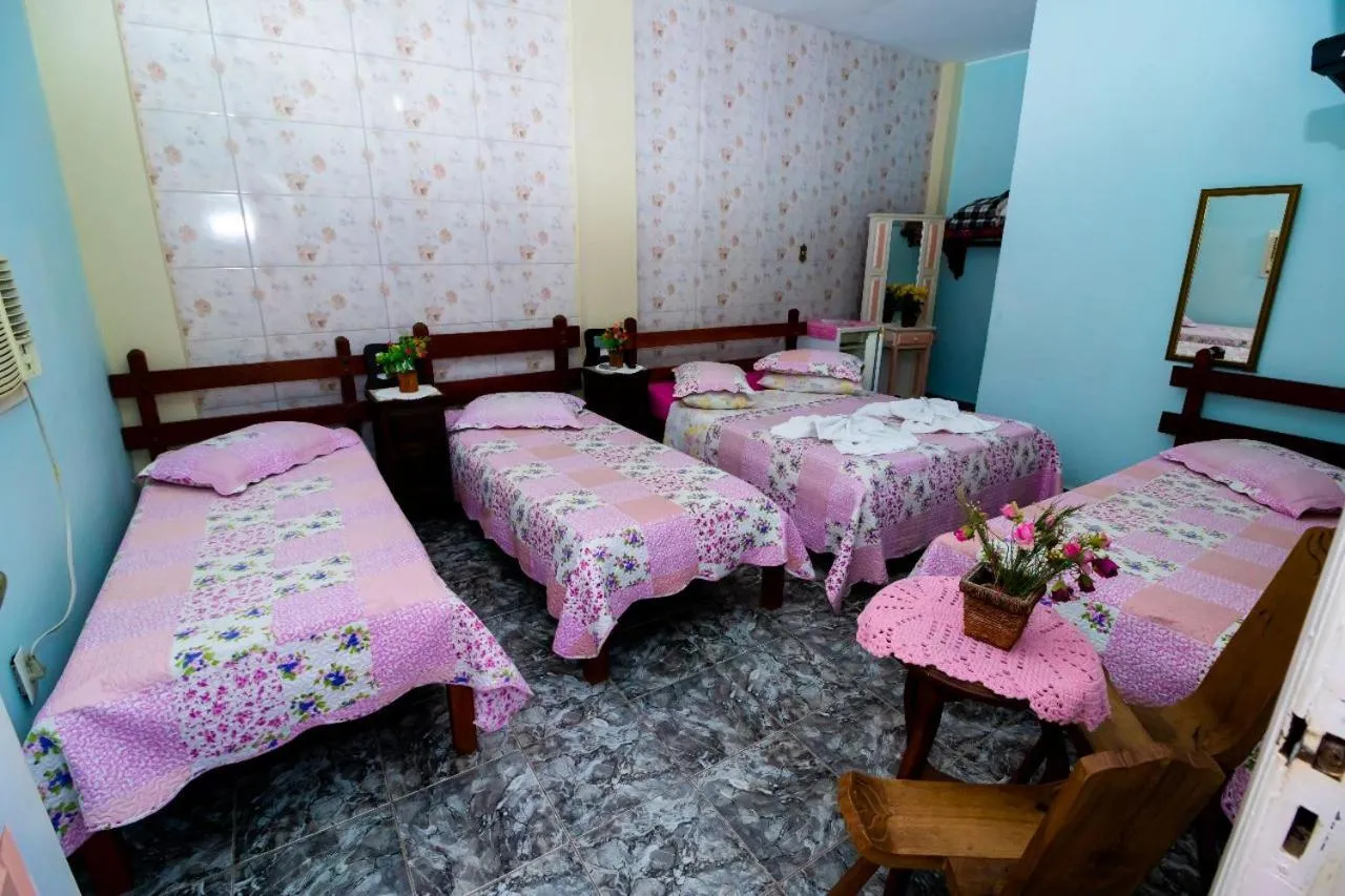Bed in Pousada Oca Porã