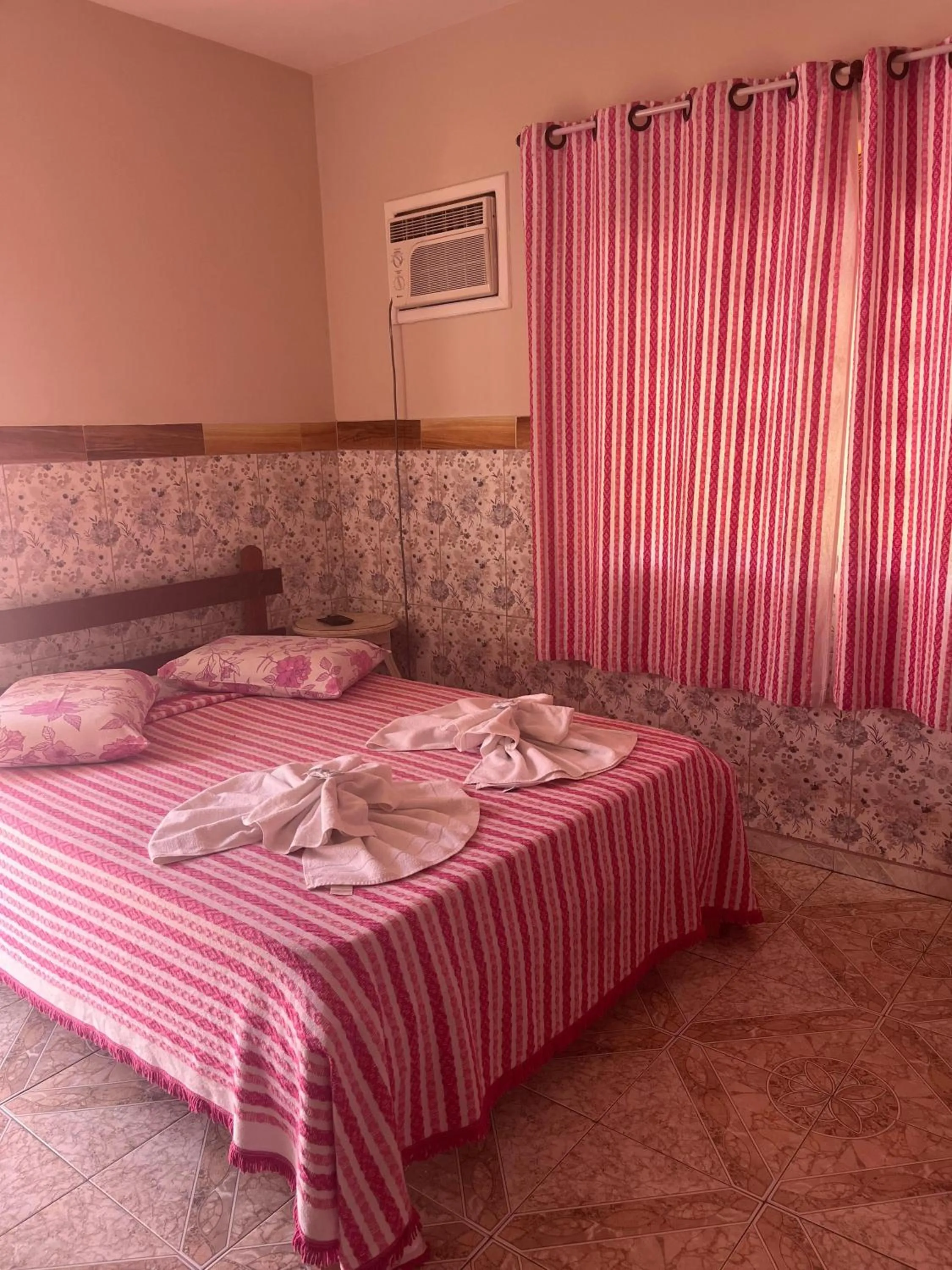 Bed in Pousada Oca Porã