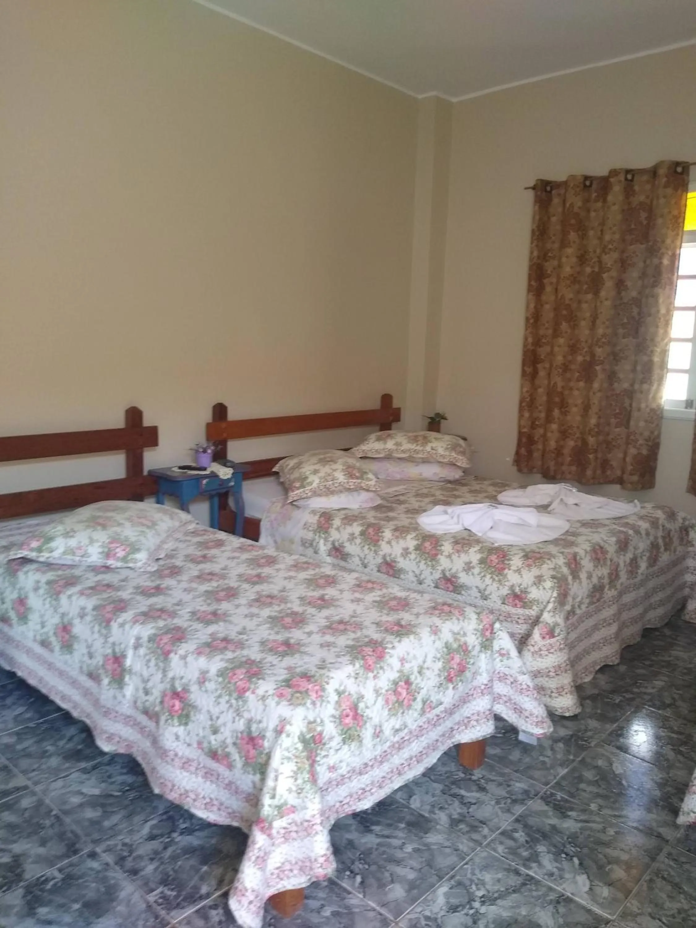 Bed in Pousada Oca Porã