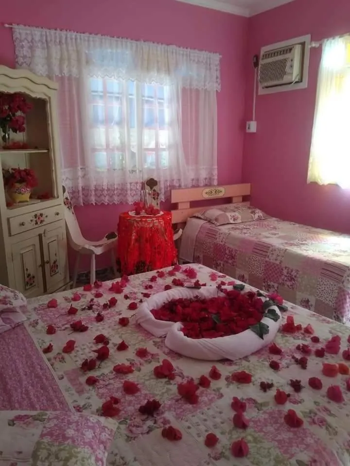 Bed in Pousada Oca Porã