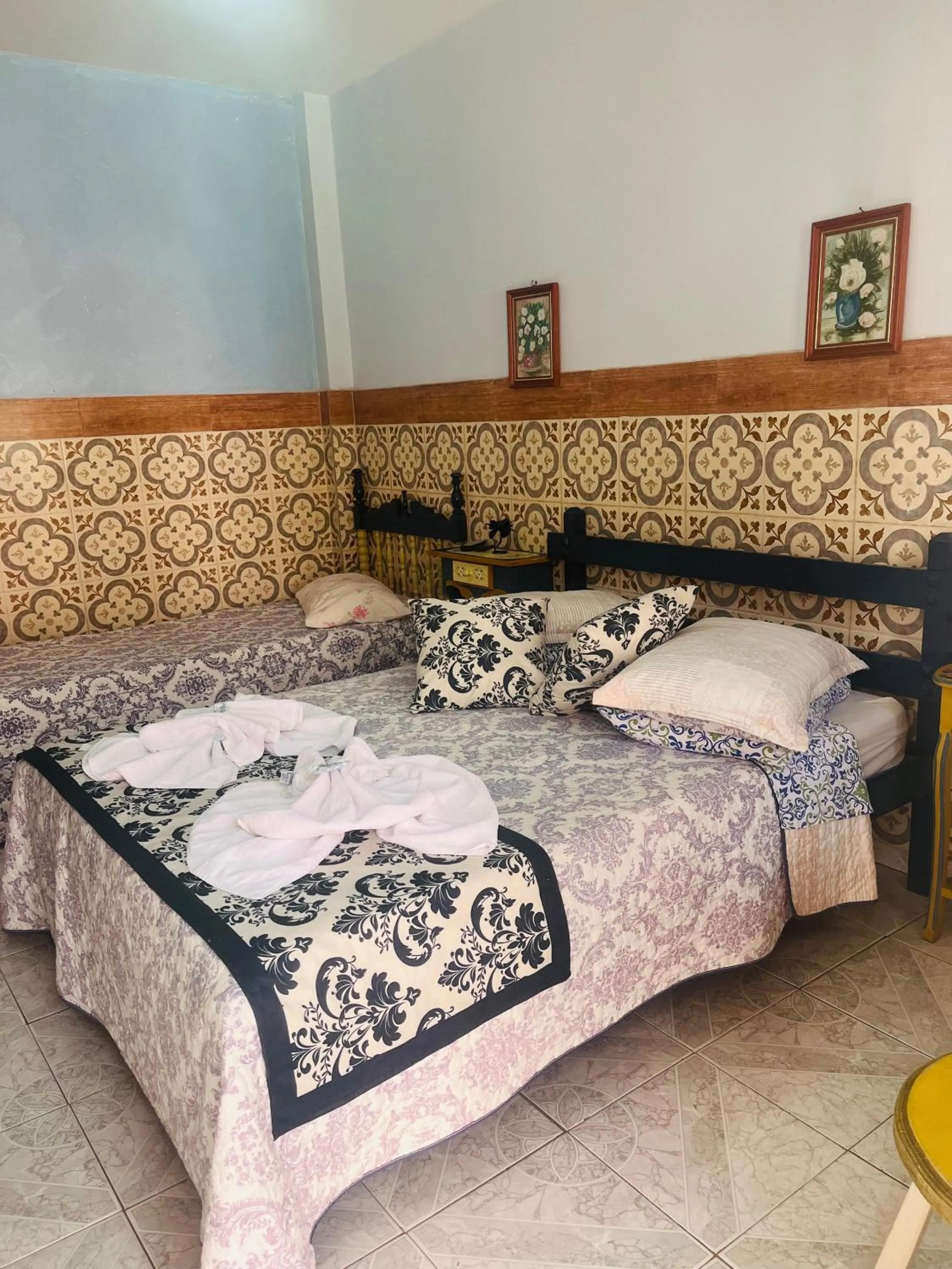 Bed in Pousada Oca Porã