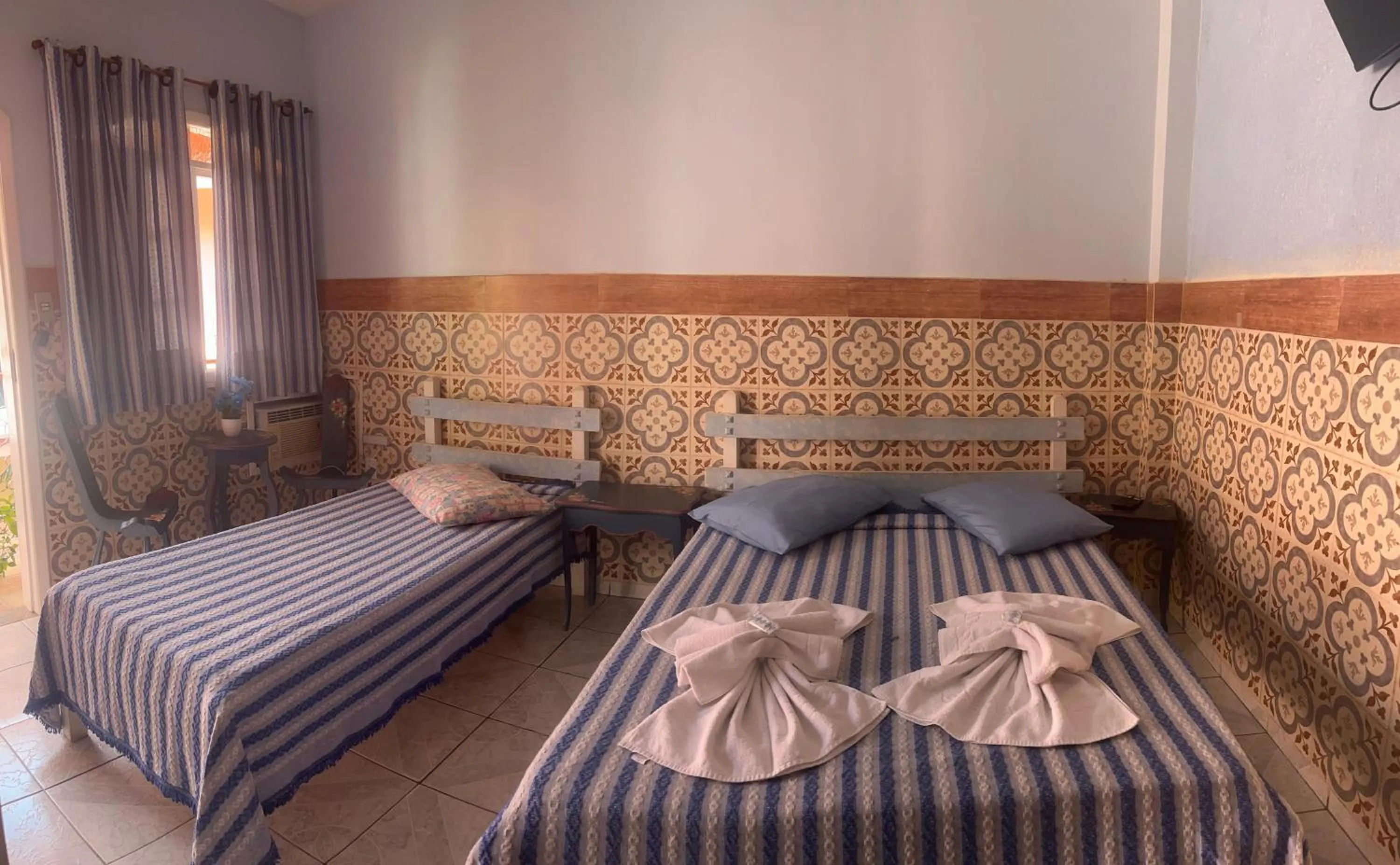 Bed in Pousada Oca Porã