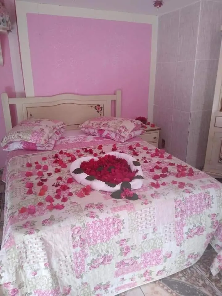Bed in Pousada Oca Porã