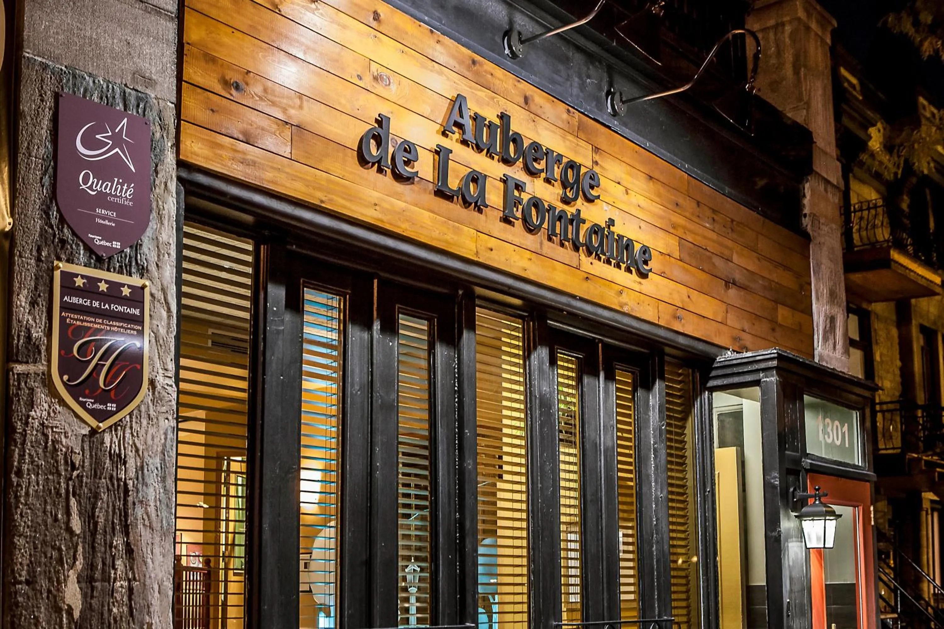 Property logo or sign in Auberge de La Fontaine