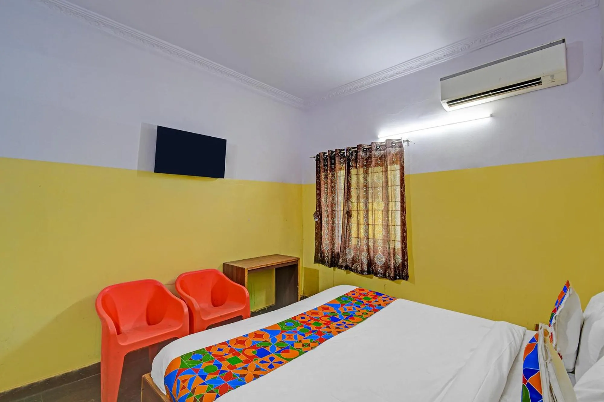 Bed in FabHotel Mohith Gokul