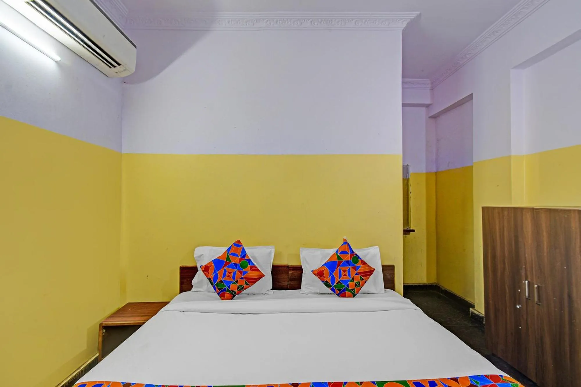 Bed in FabHotel Mohith Gokul