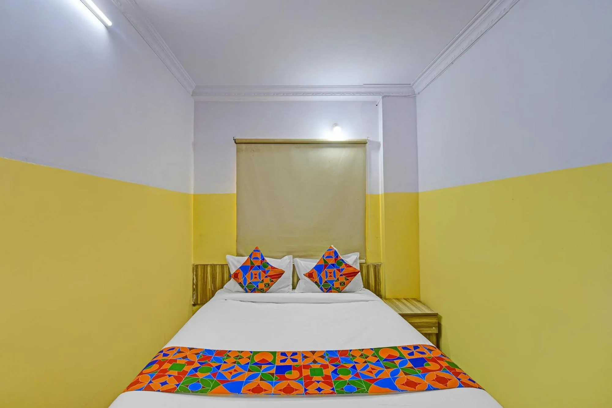 Bed in FabHotel Mohith Gokul