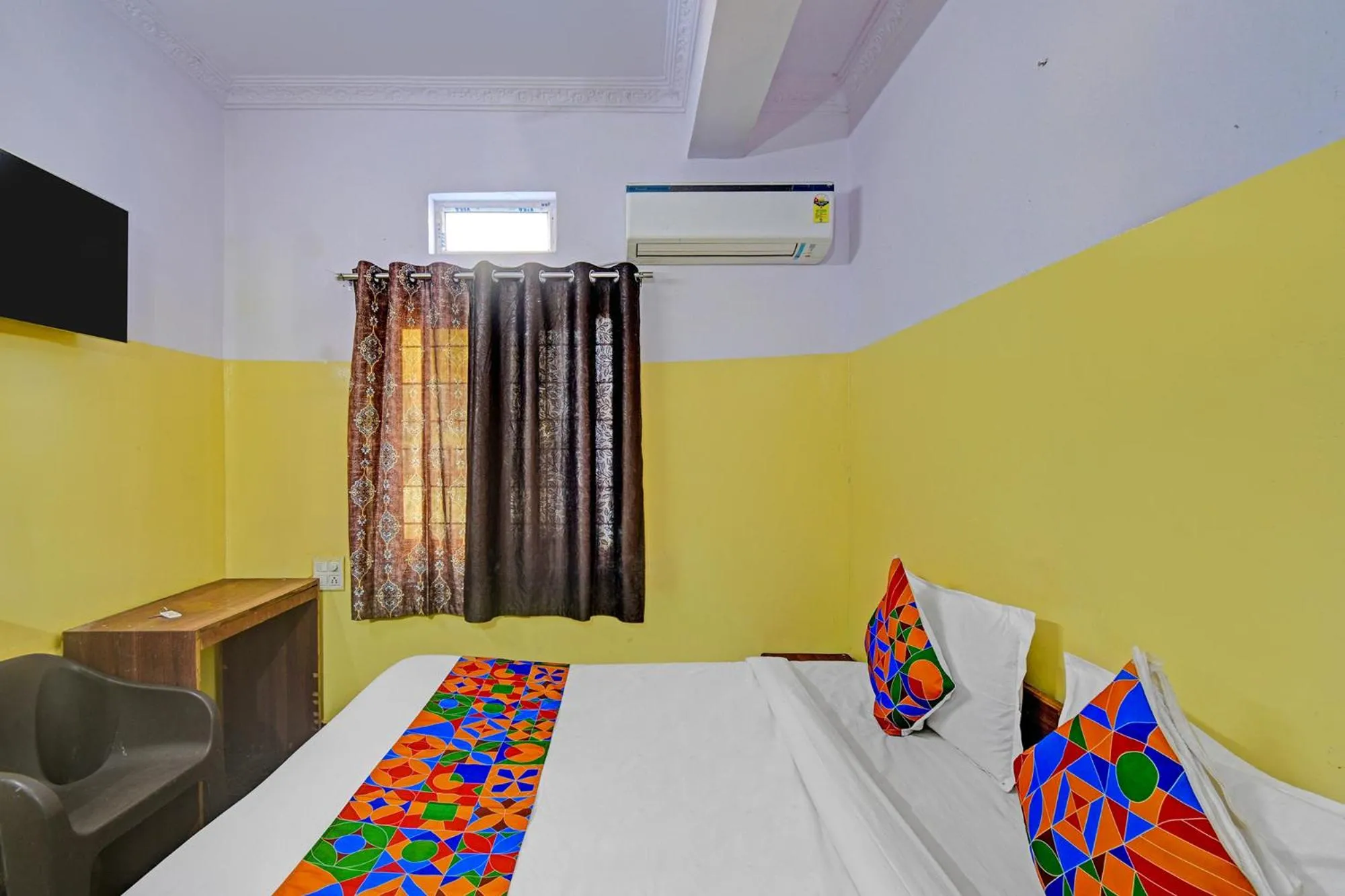 Bed in FabHotel Mohith Gokul