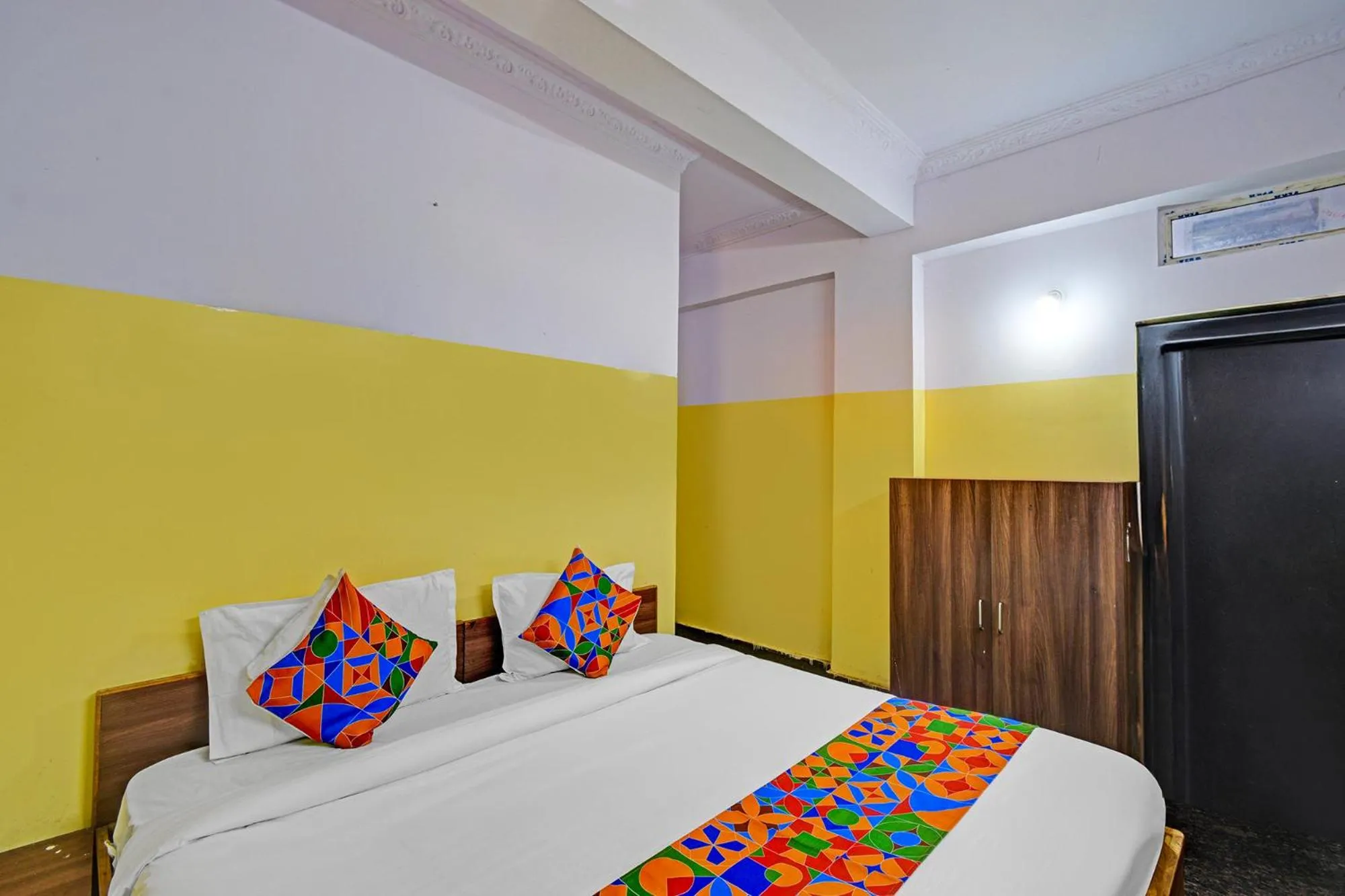 Bed in FabHotel Mohith Gokul