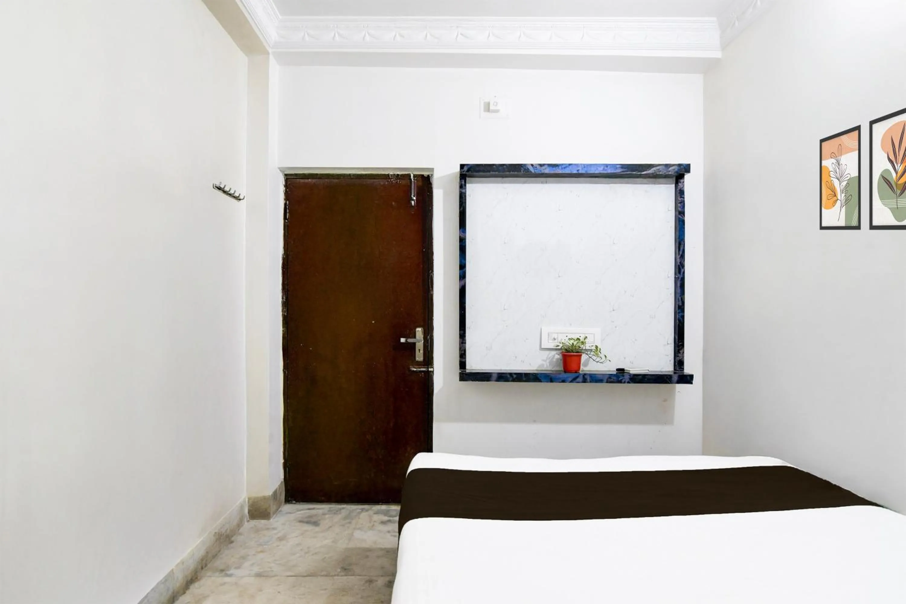 Bedroom in Hotel Continental Restuarant & Cafe