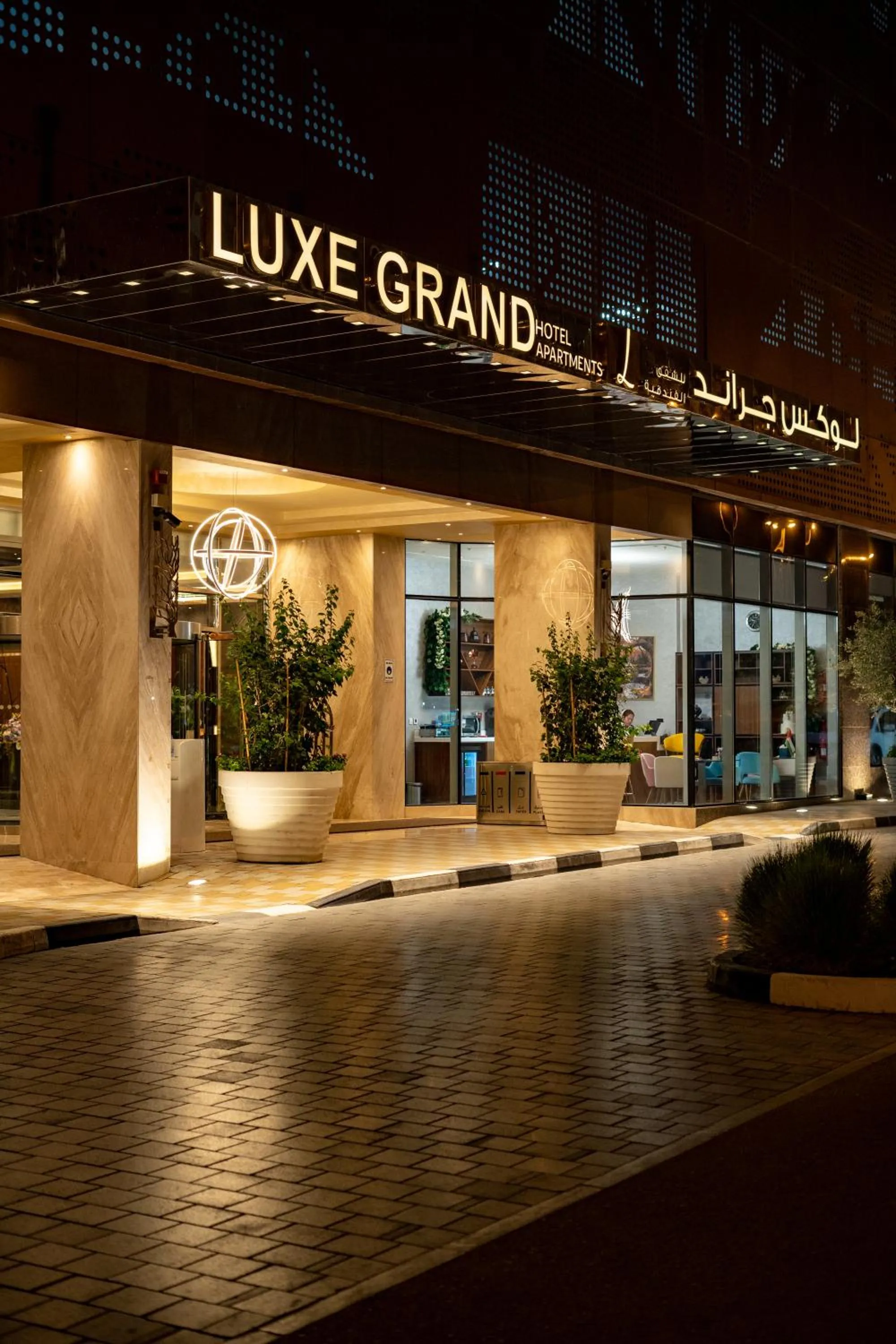 Property building in Luxe Grand Hotel Apartments