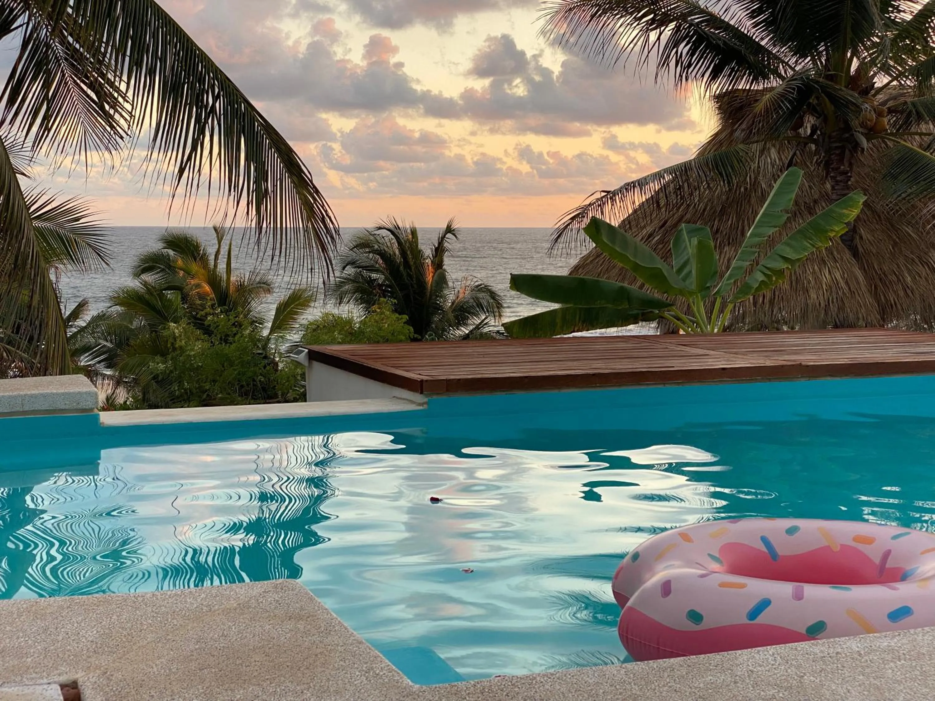 Swimming pool in Beachfront Paradise Boutique Hotel