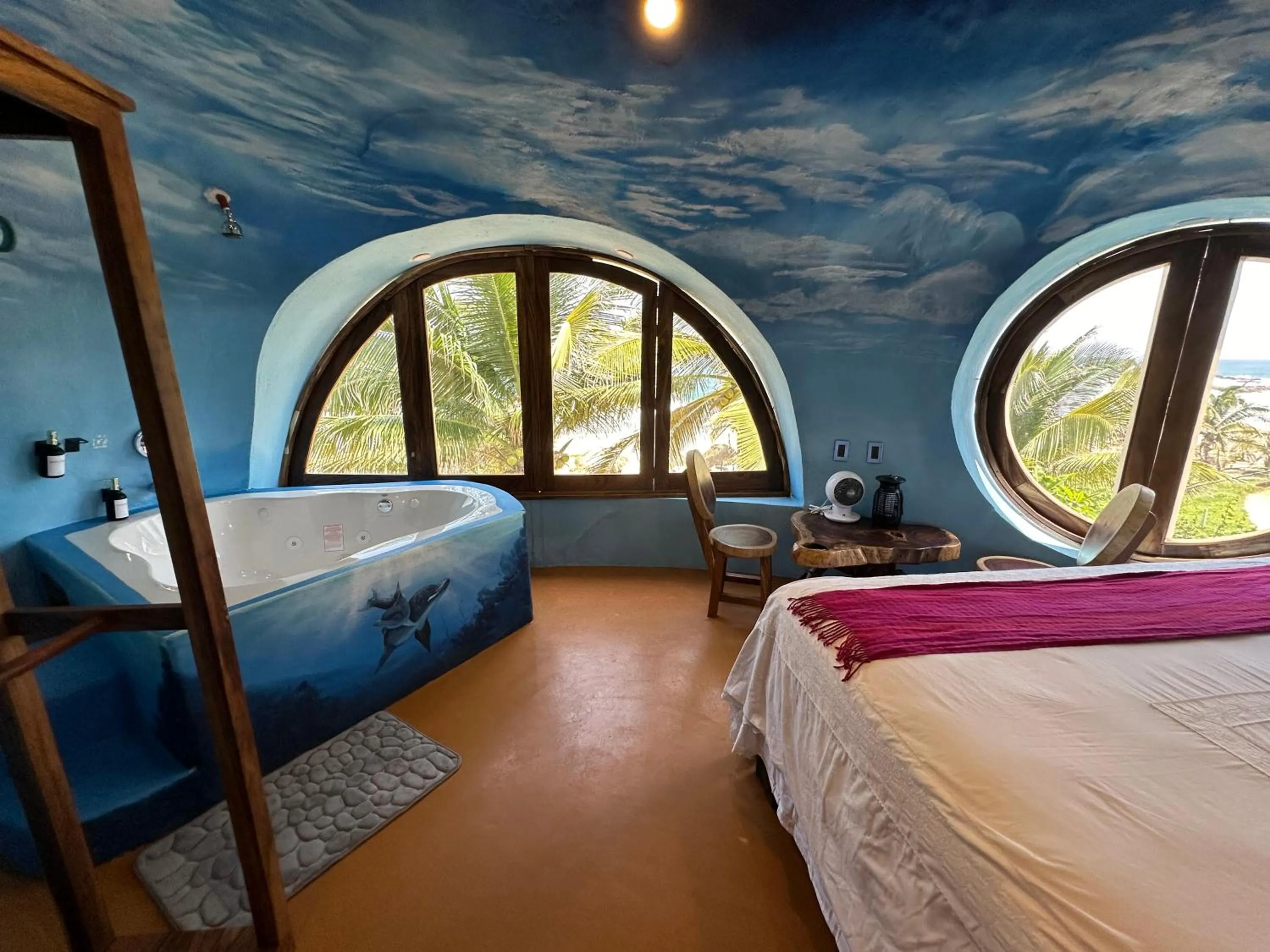 Bed in Beachfront Paradise Boutique Hotel