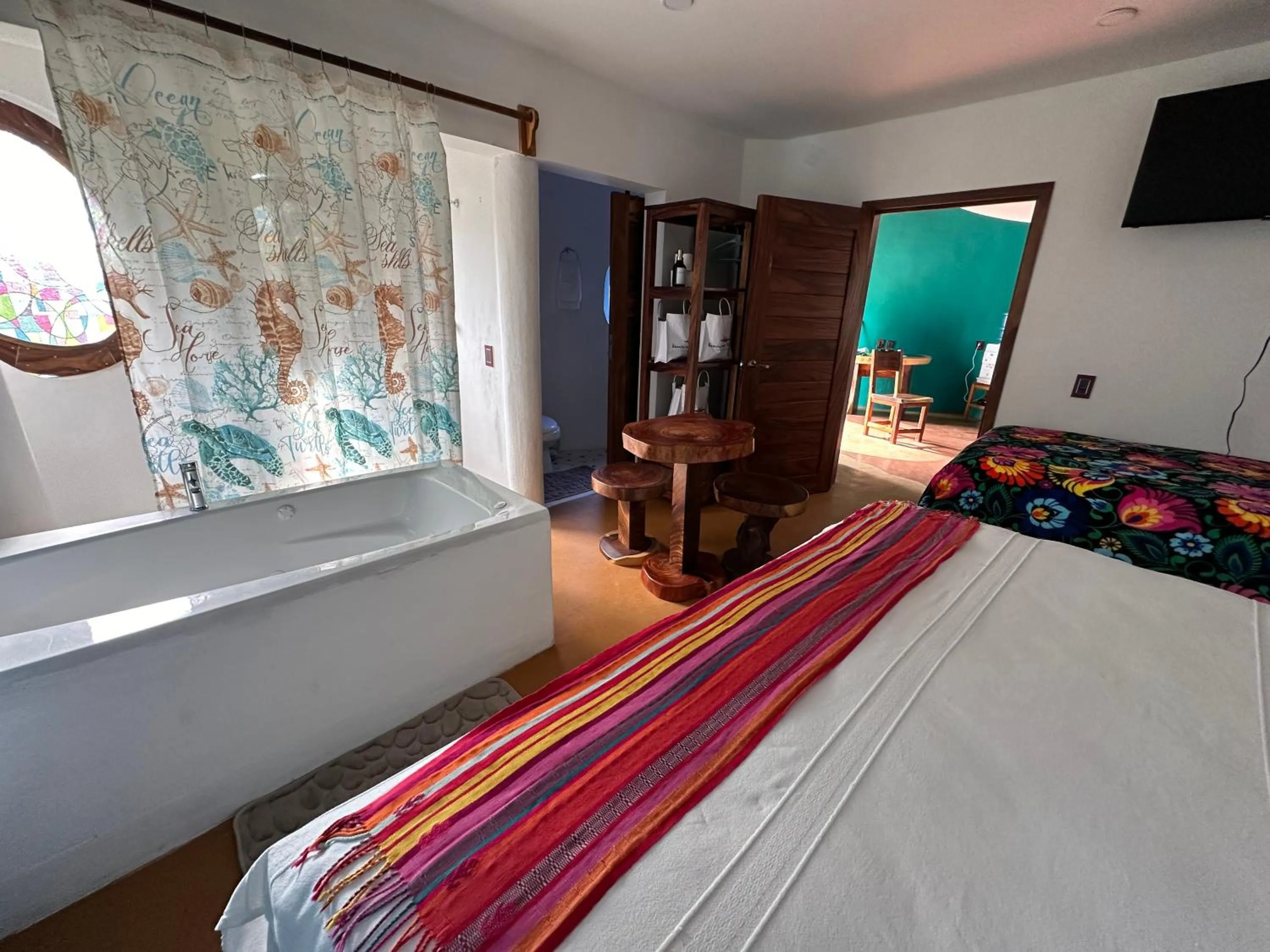 Bed in Beachfront Paradise Boutique Hotel