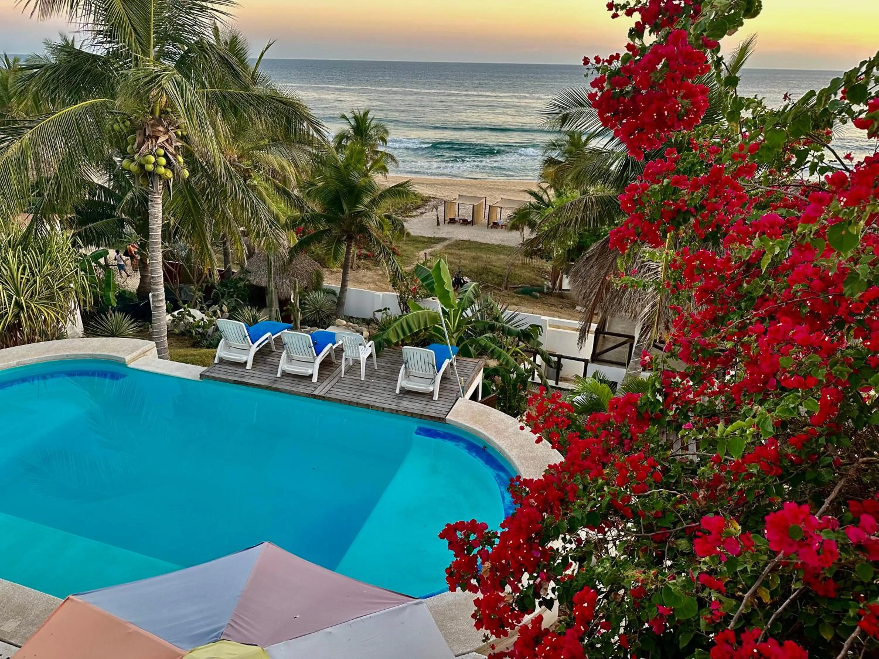 Swimming pool in Beachfront Paradise Boutique Hotel